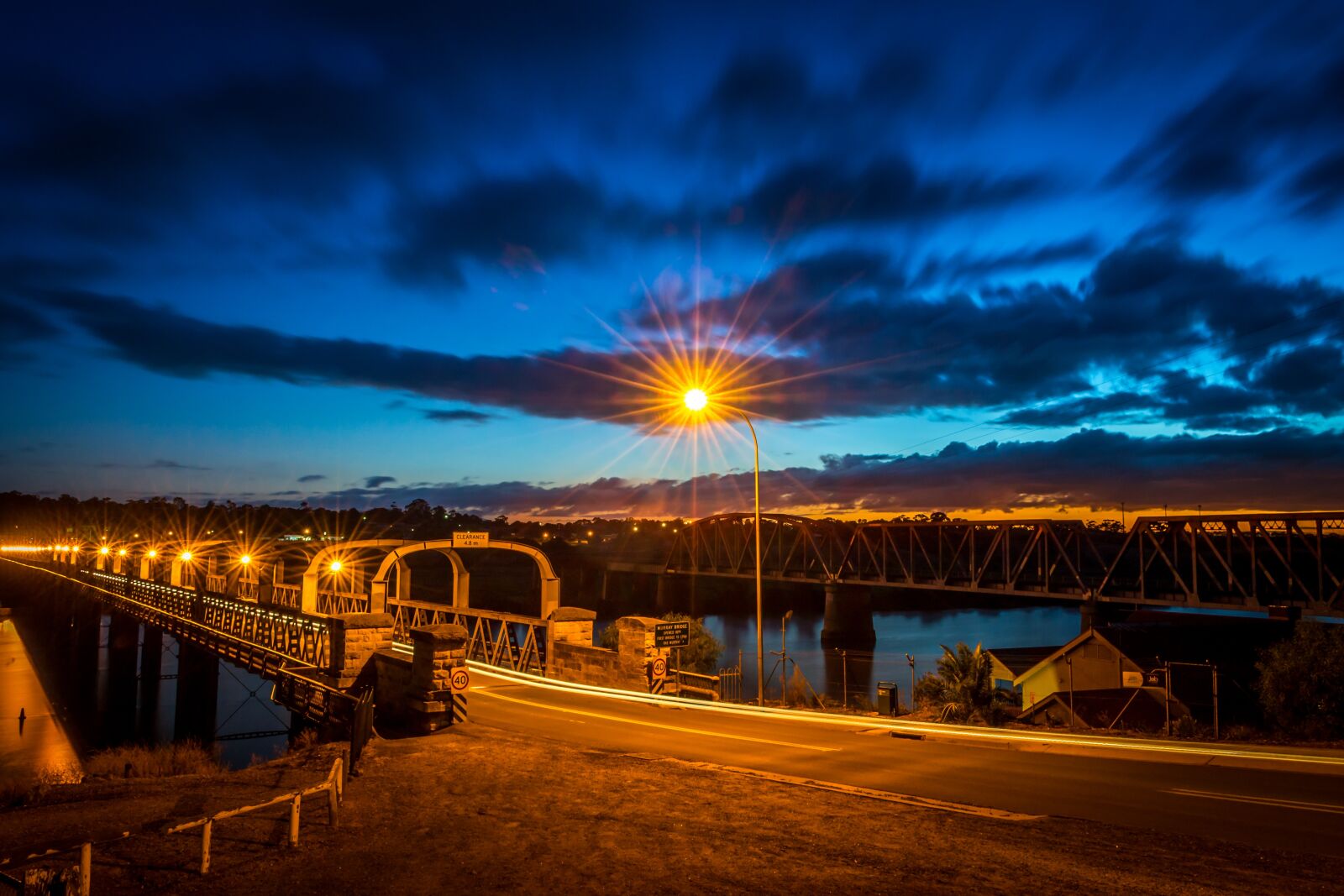 Nikon D3100 sample photo. Bridge, starburst, river photography