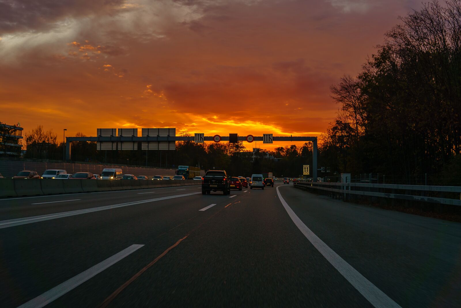 30mm F1.4 DC DN | Contemporary 016 sample photo. Traffic, highway, sunset photography