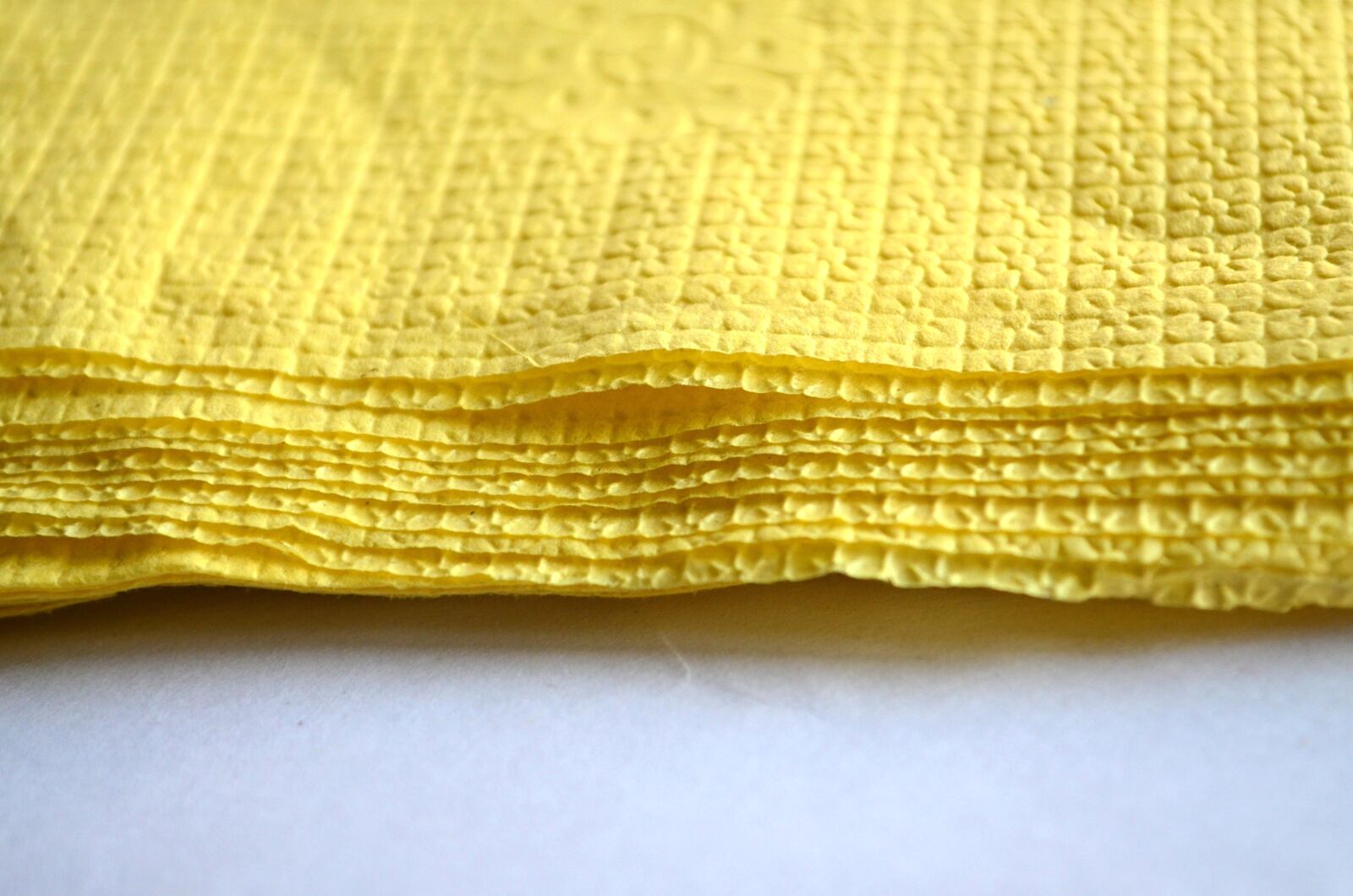 Nikon D5100 sample photo. Yellow paper, fiber, handkerchief photography