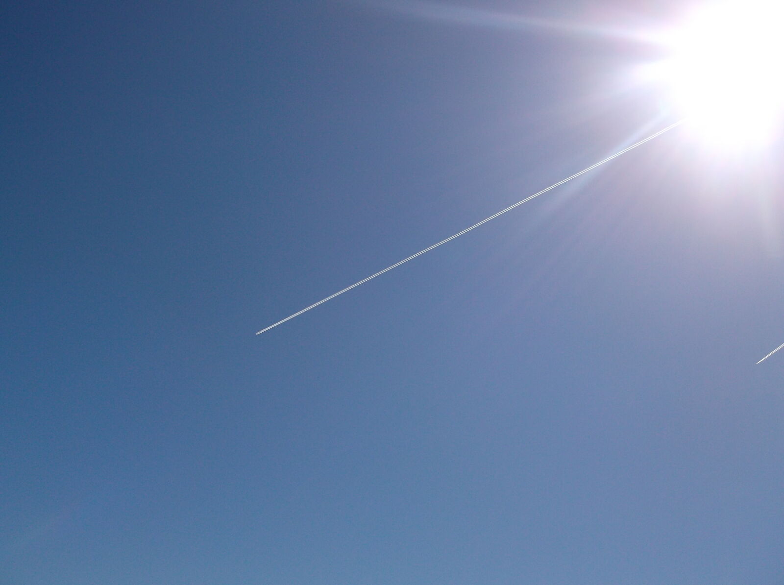 Fujifilm FinePix AX550 sample photo. Blue, sky, chemtrails, weather photography