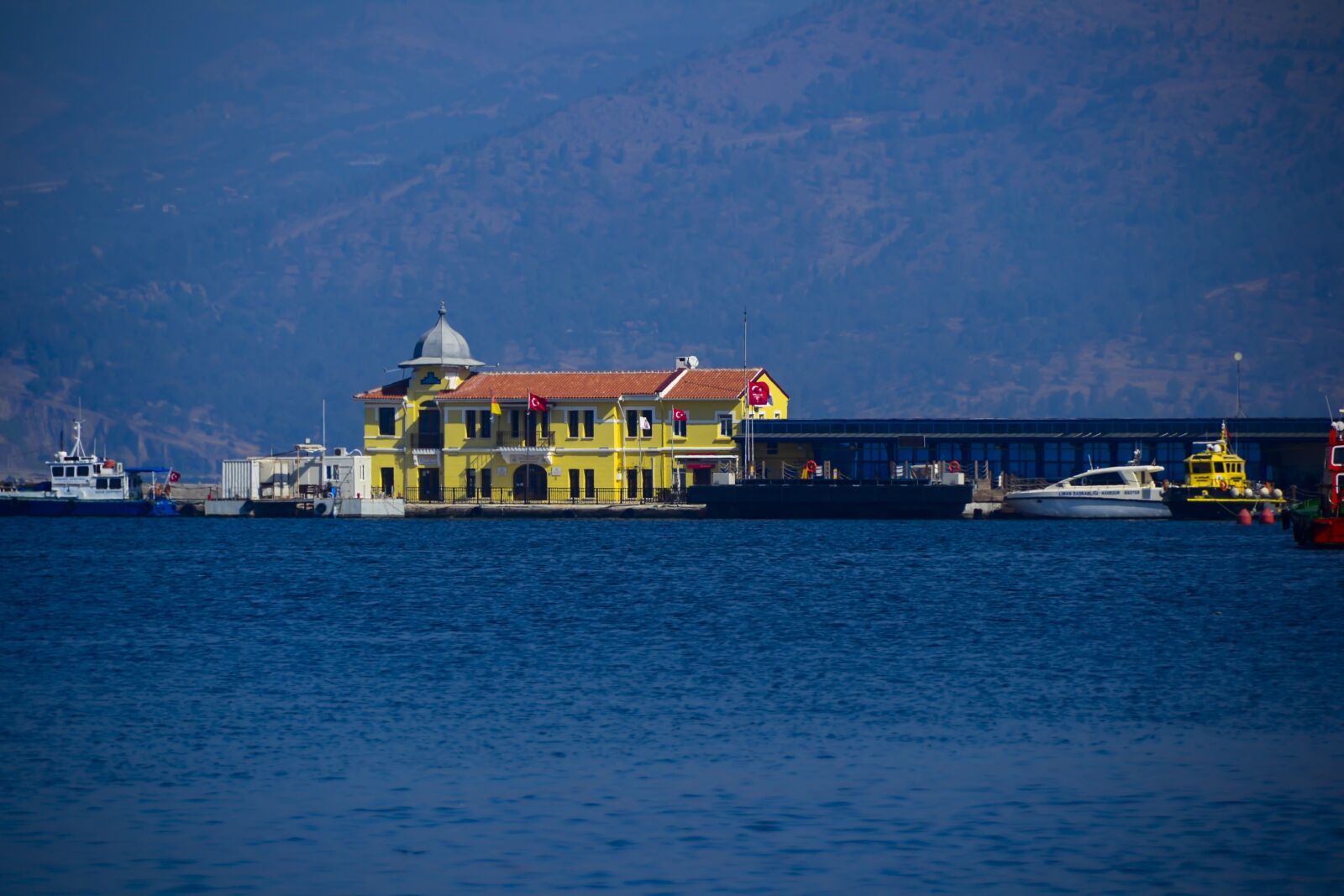 Nikon D3100 sample photo. Pier, mansion, ocean photography