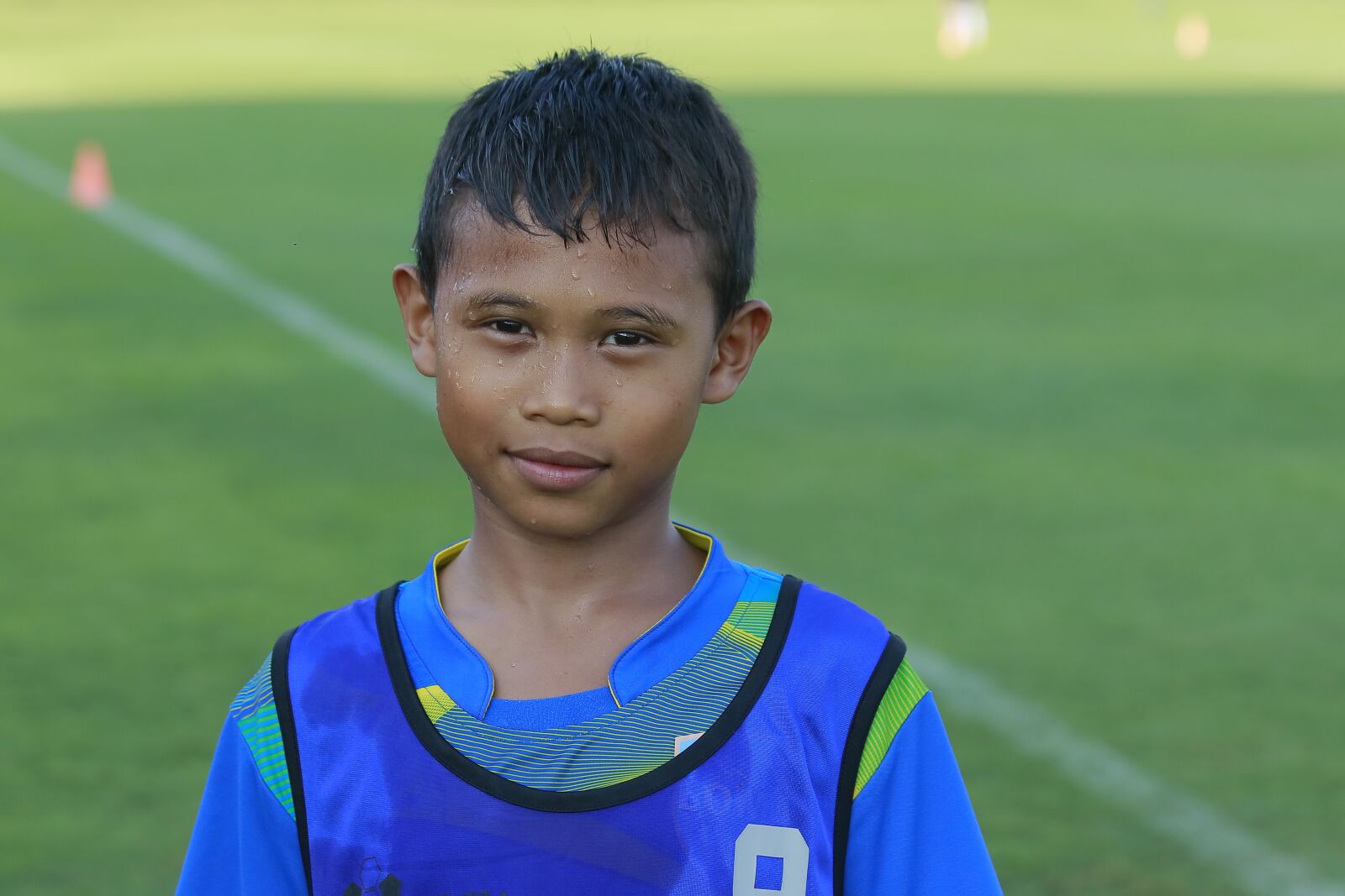 Canon EF 70-300mm F4-5.6 IS USM sample photo. Smile, football, kids photography