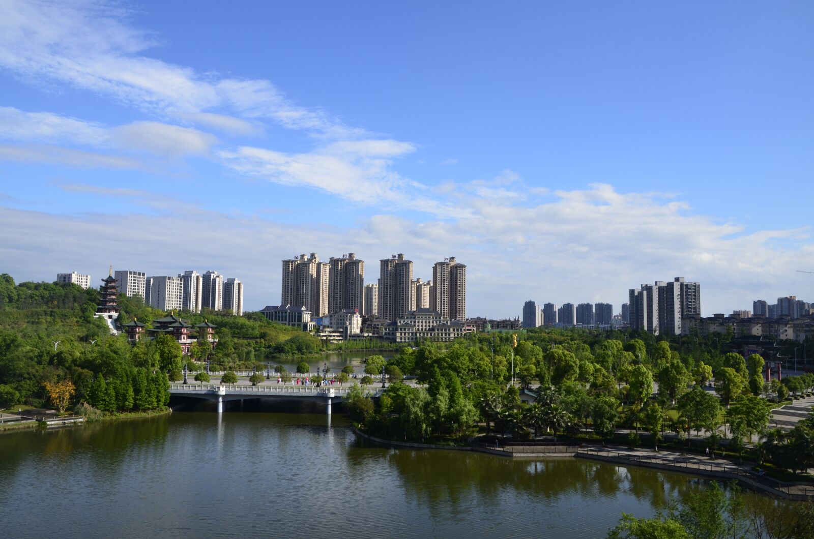 Nikon D7000 sample photo. Sky, lake, tall buildings photography