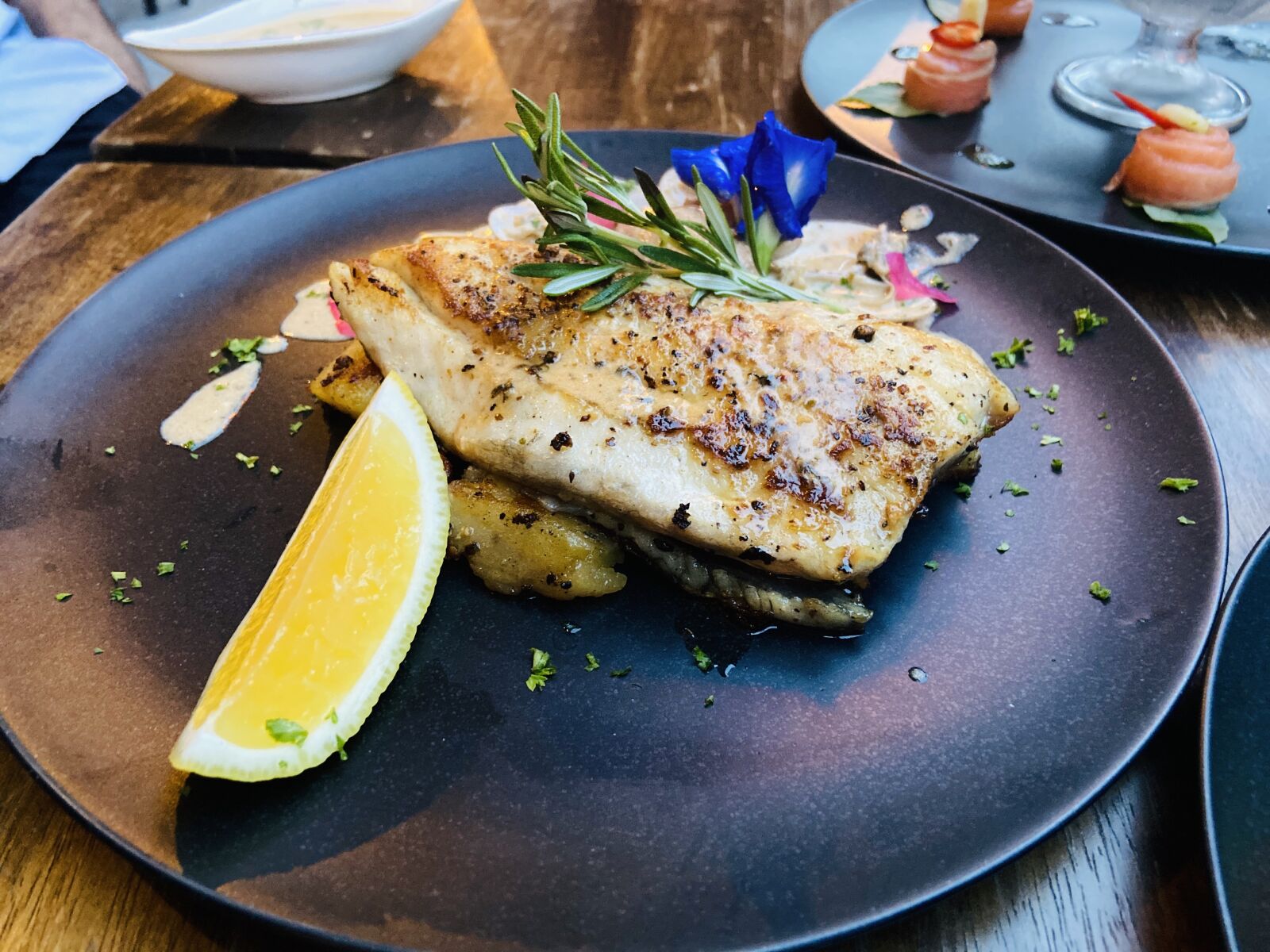 Apple iPhone 11 + iPhone 11 back dual wide camera 4.25mm f/1.8 sample photo. Grilled, sea, bass photography