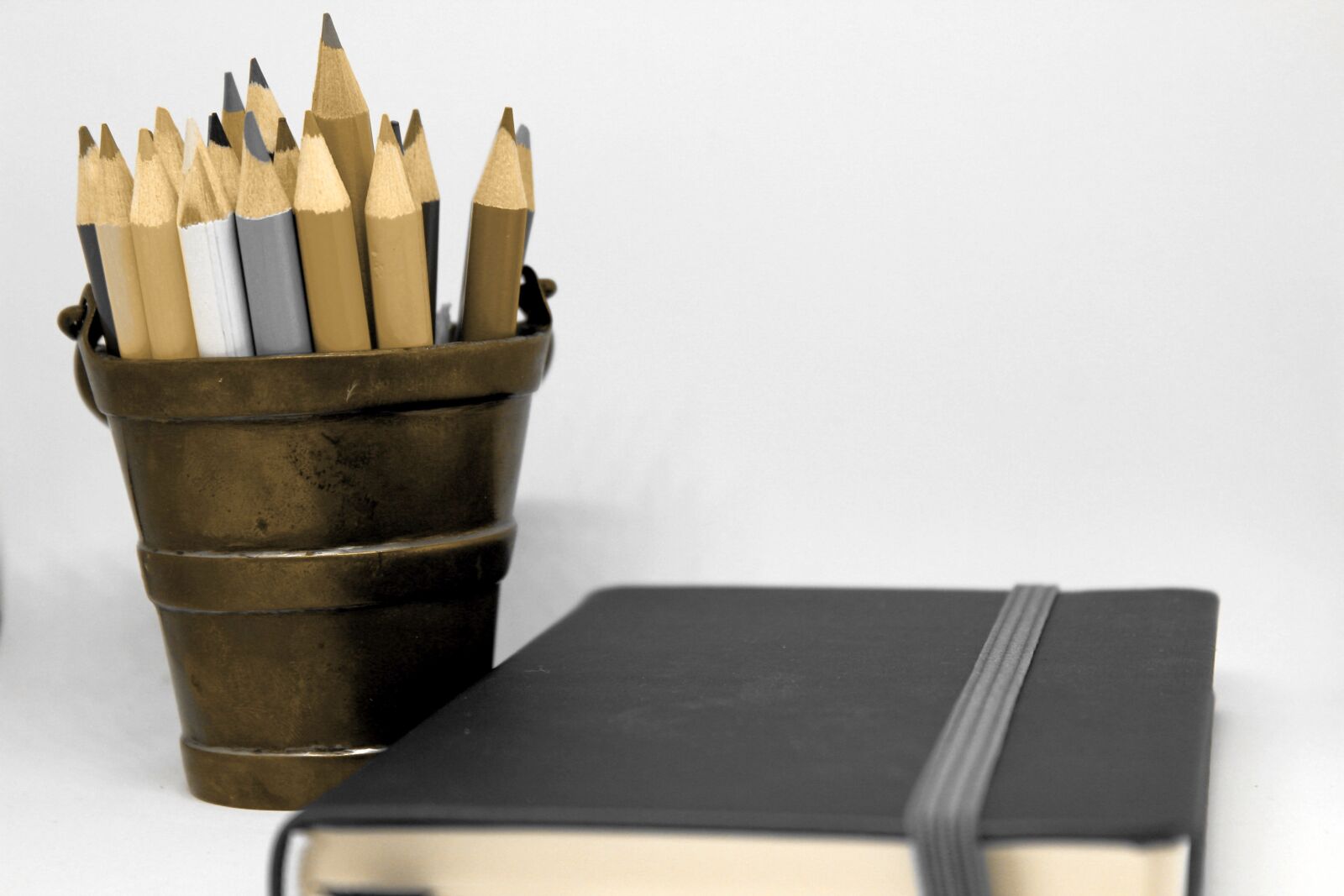 Canon EOS 550D (EOS Rebel T2i / EOS Kiss X4) sample photo. Pencils, notebook, brass photography