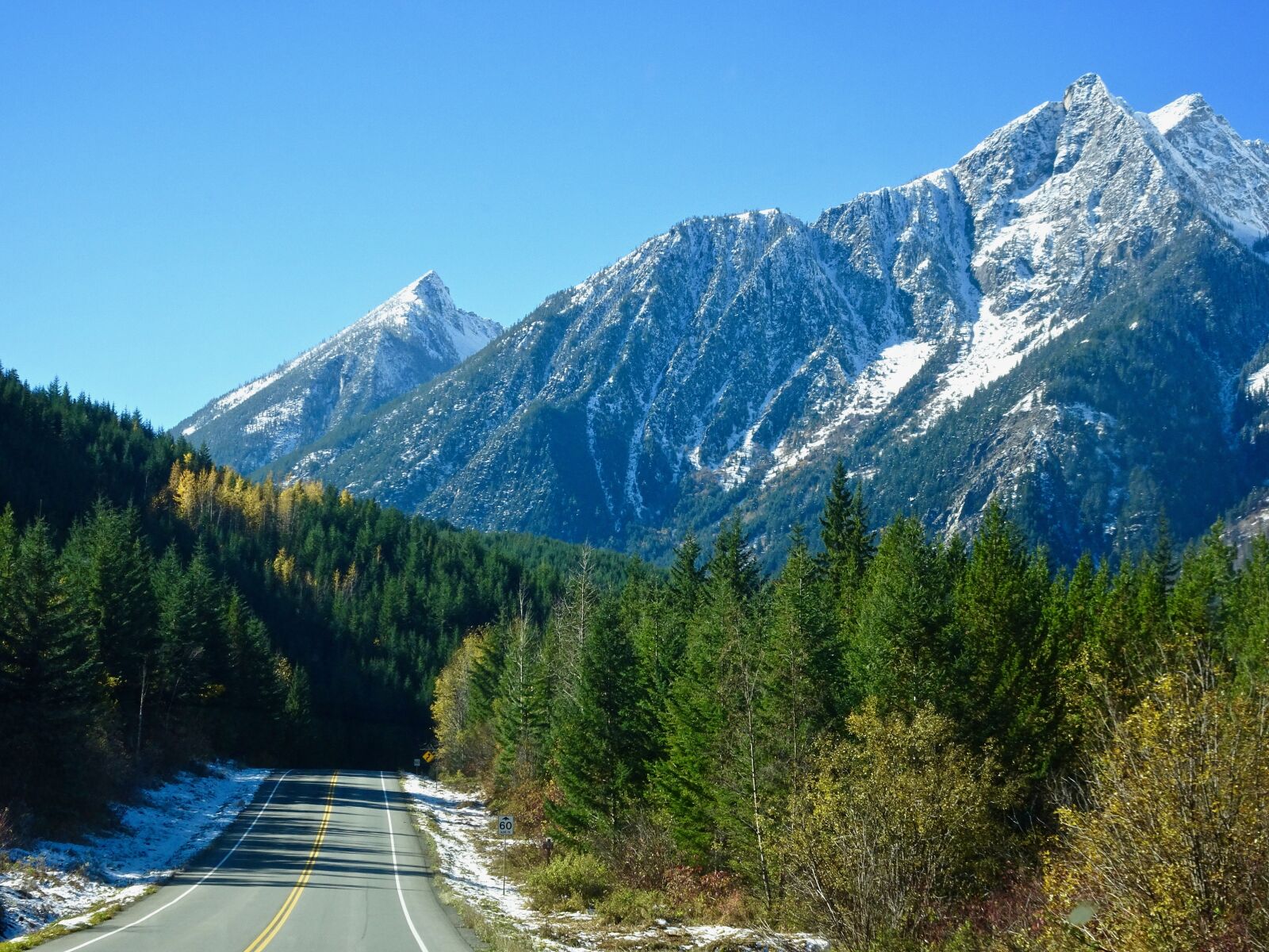 Sony Cyber-shot DSC-HX90V sample photo. Highway, mountains, snow photography