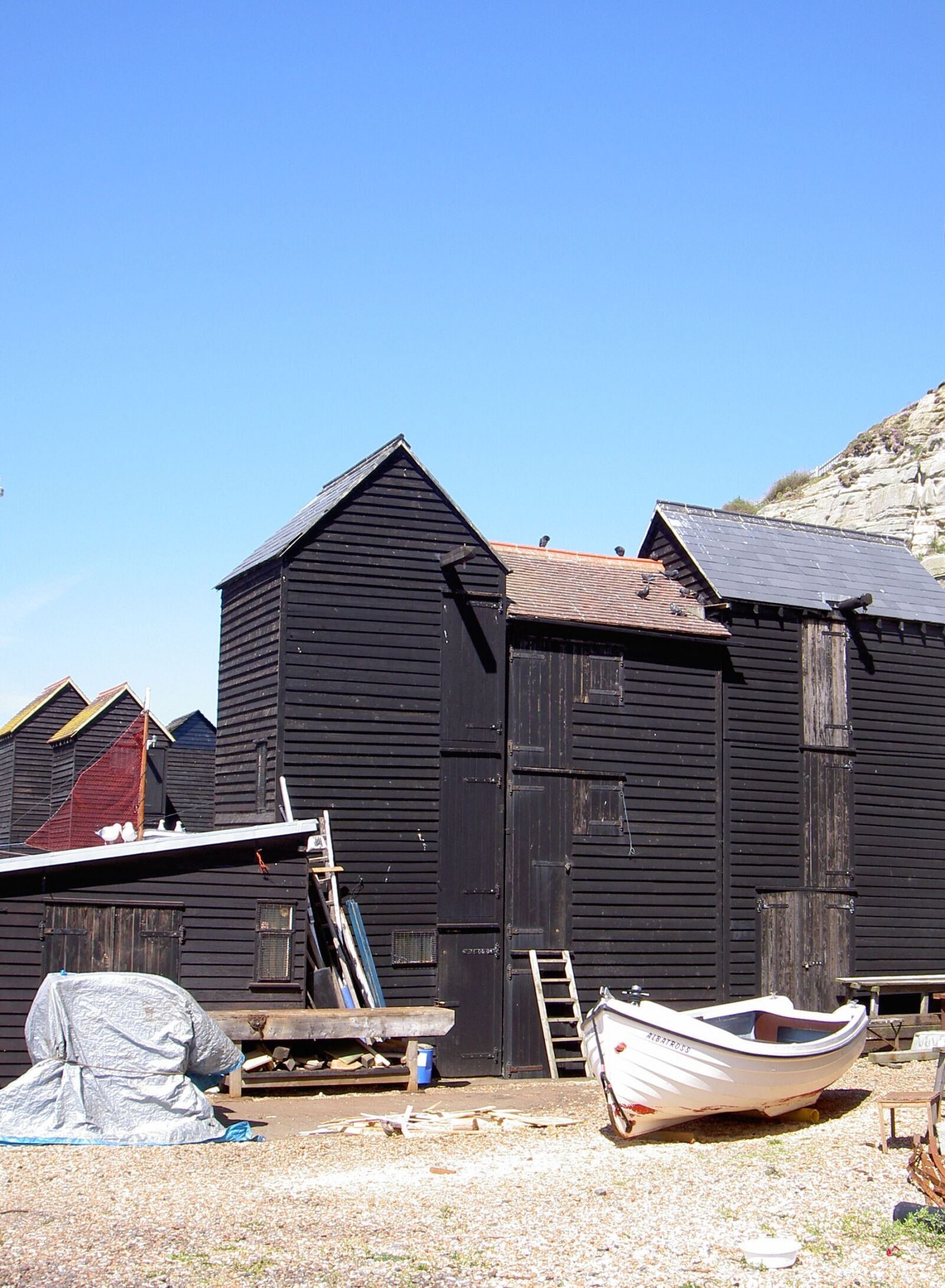 KONICA MINOLTA DiMAGE G500 sample photo. Fisherman's sheds, boat, house photography