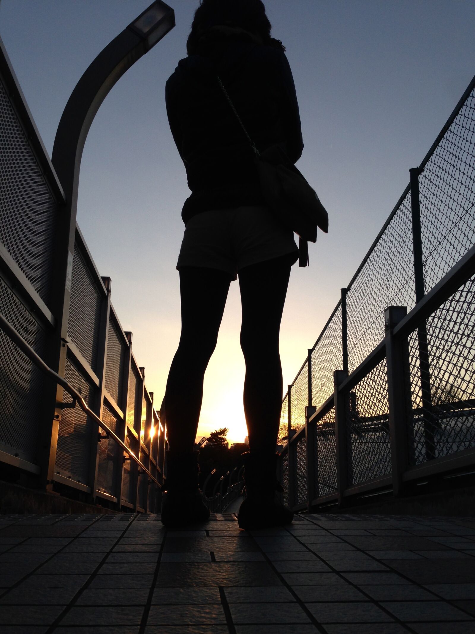 Apple iPhone 5 sample photo. Women, silhouette, from behind photography