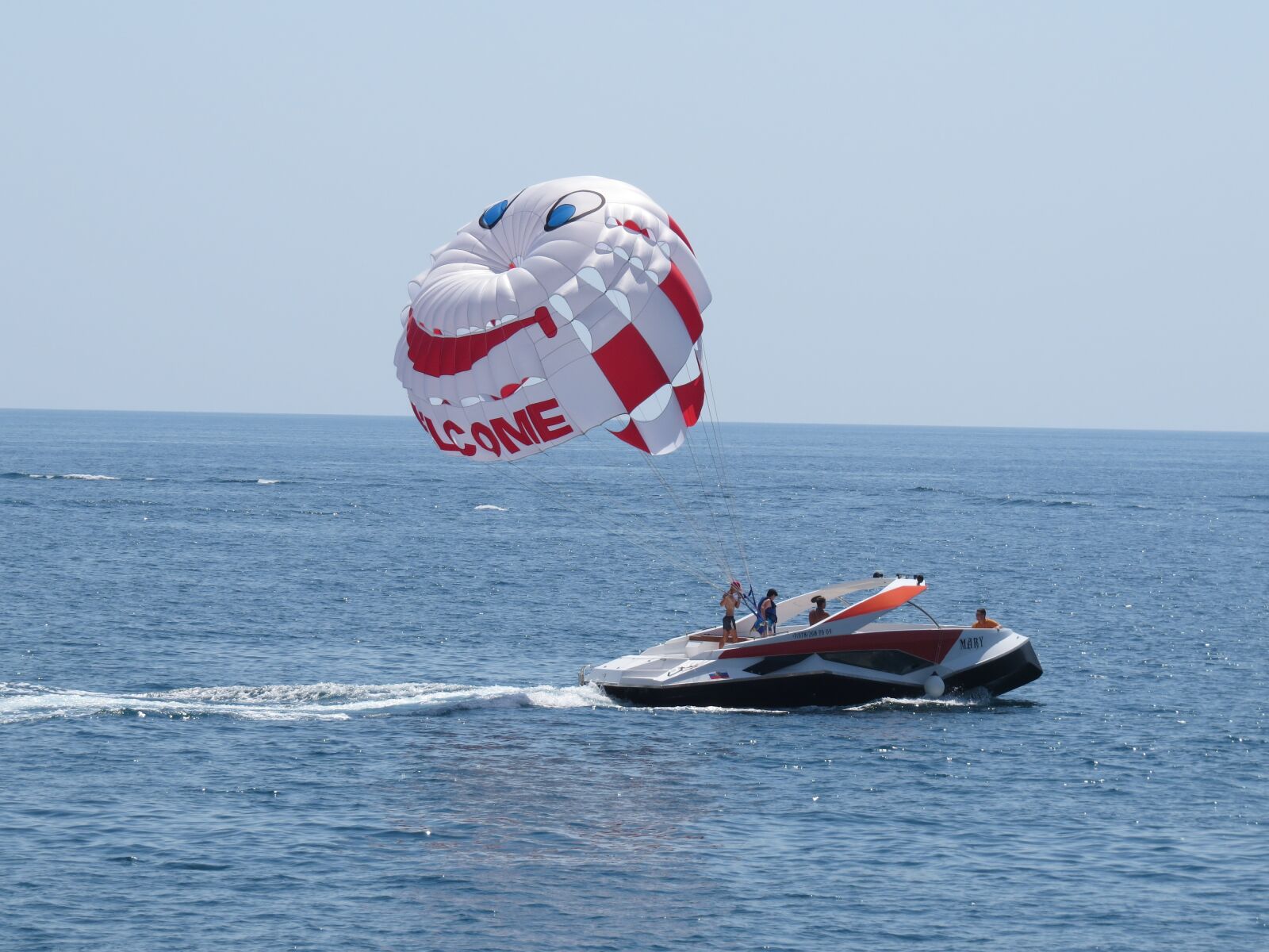 Canon PowerShot SX50 HS sample photo. Parachute, sea, entertainment photography