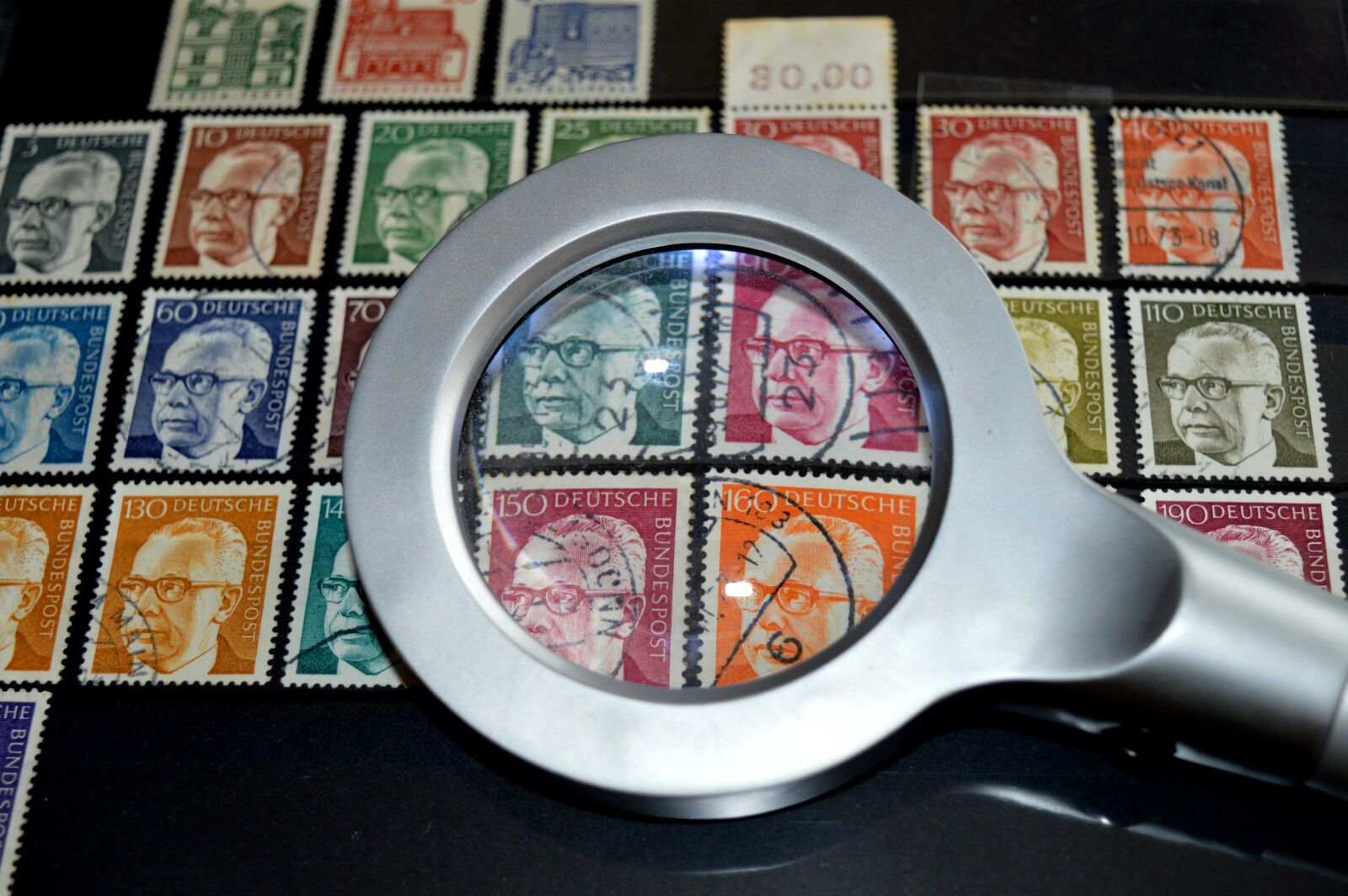 Nikon D3200 sample photo. Stamp album, magnifying glass photography