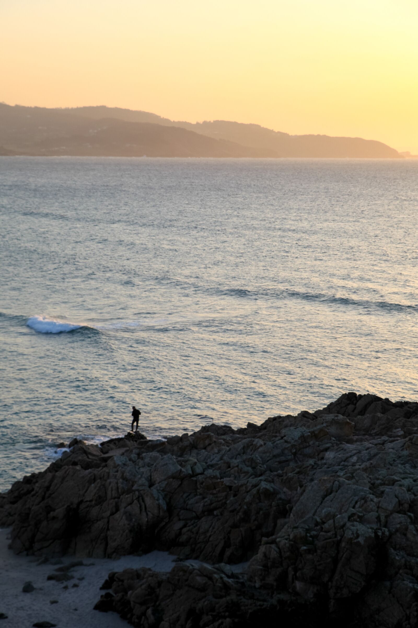 Canon EOS 5D Mark II sample photo. Sea, fisherman, rocks photography
