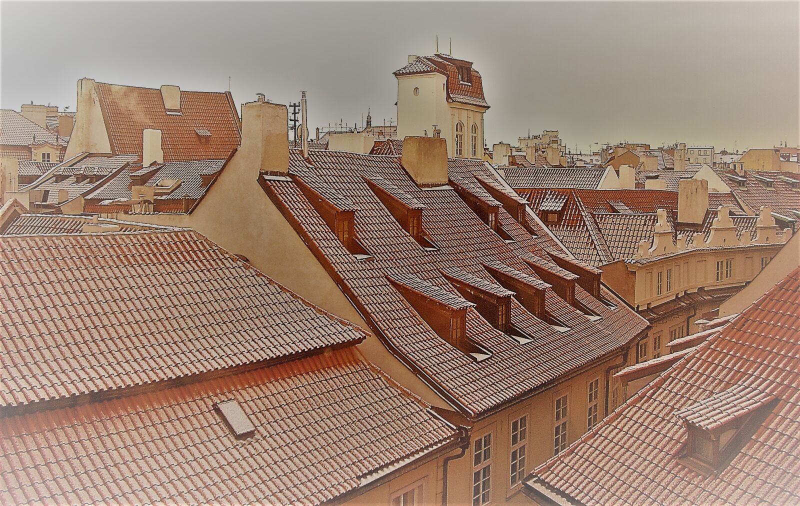 Nikon COOLPIX L11 sample photo. Prague, roofs, snow photography