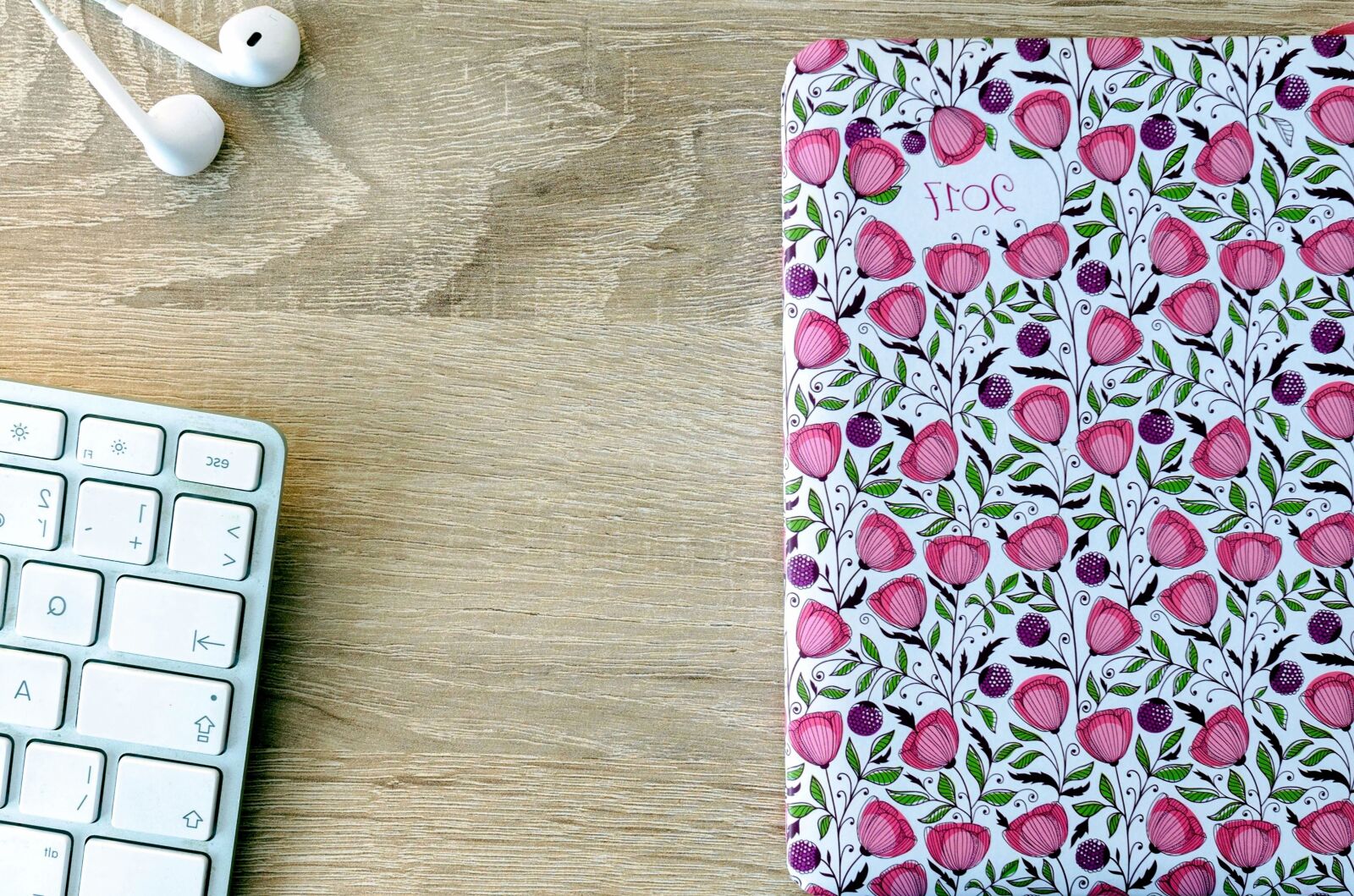 Nikon D5100 sample photo. Earphones, keyboard, notebook, paper photography