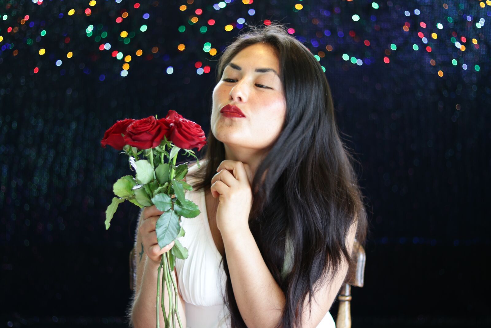 Canon EOS 80D + Canon EF 50mm F1.8 STM sample photo. Red roses, woman, bokeh photography