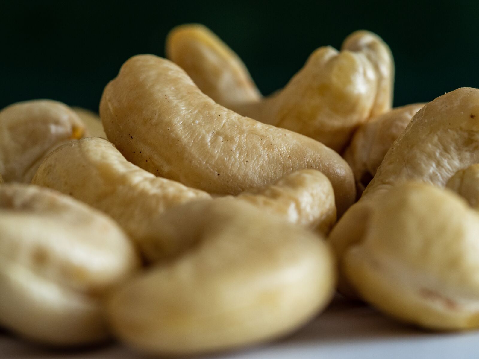 Olympus OM-D E-M10 III sample photo. Cashew, nuts, nutrition photography