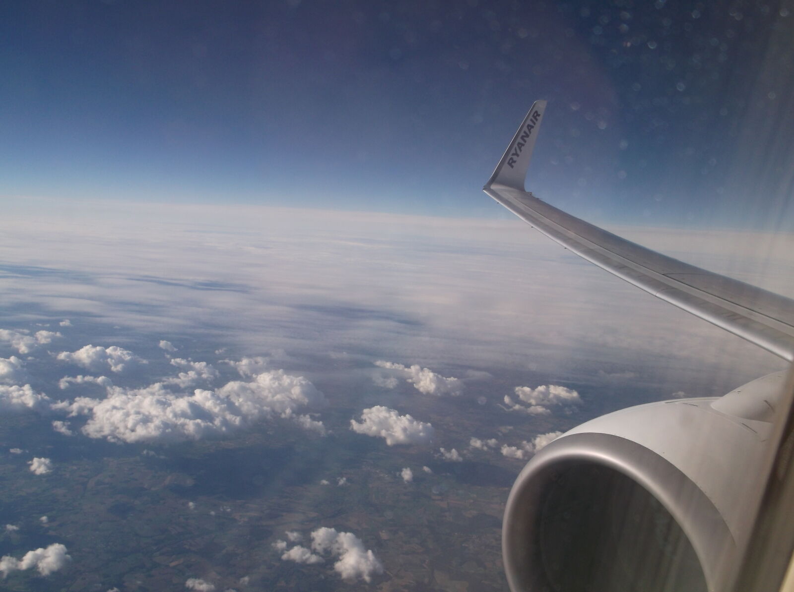 Fujifilm FinePix AX550 sample photo. Airplane, flying, ryanair, sky photography