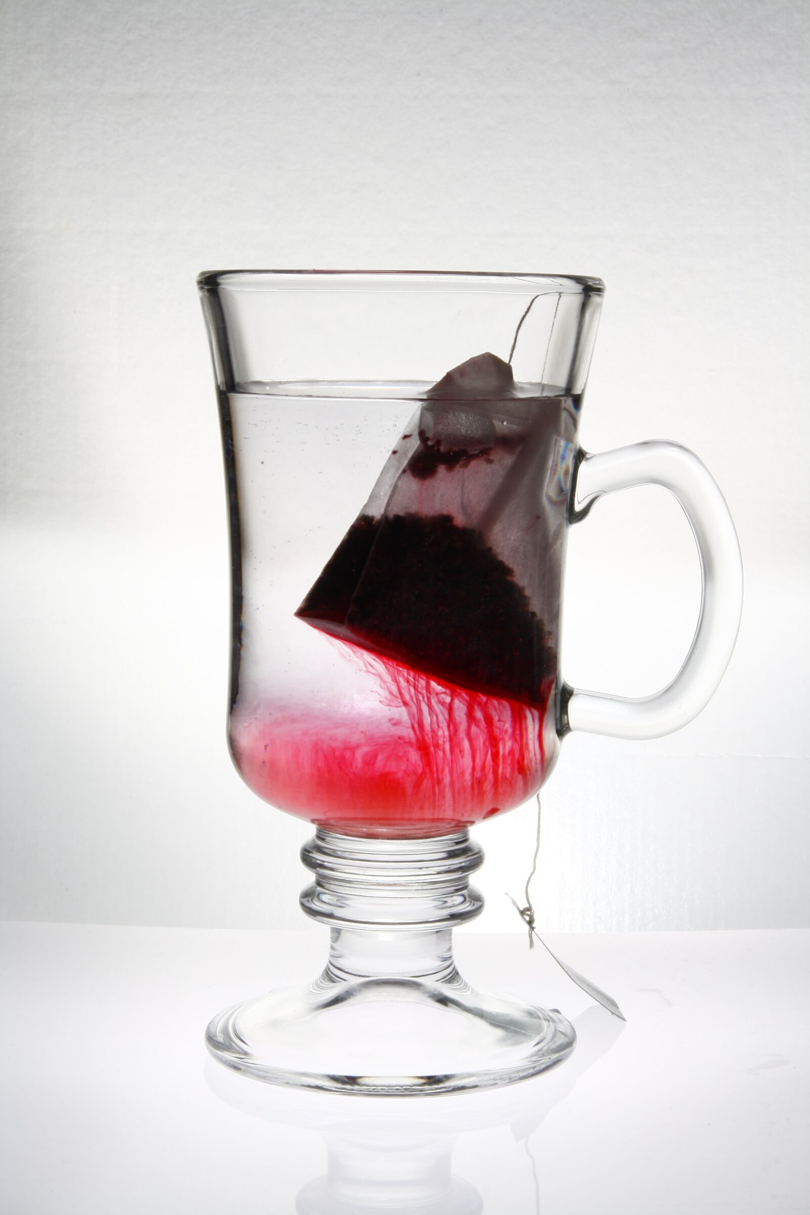 Canon EOS 1000D (EOS Digital Rebel XS / EOS Kiss F) sample photo. Tea glass, red, fruit photography