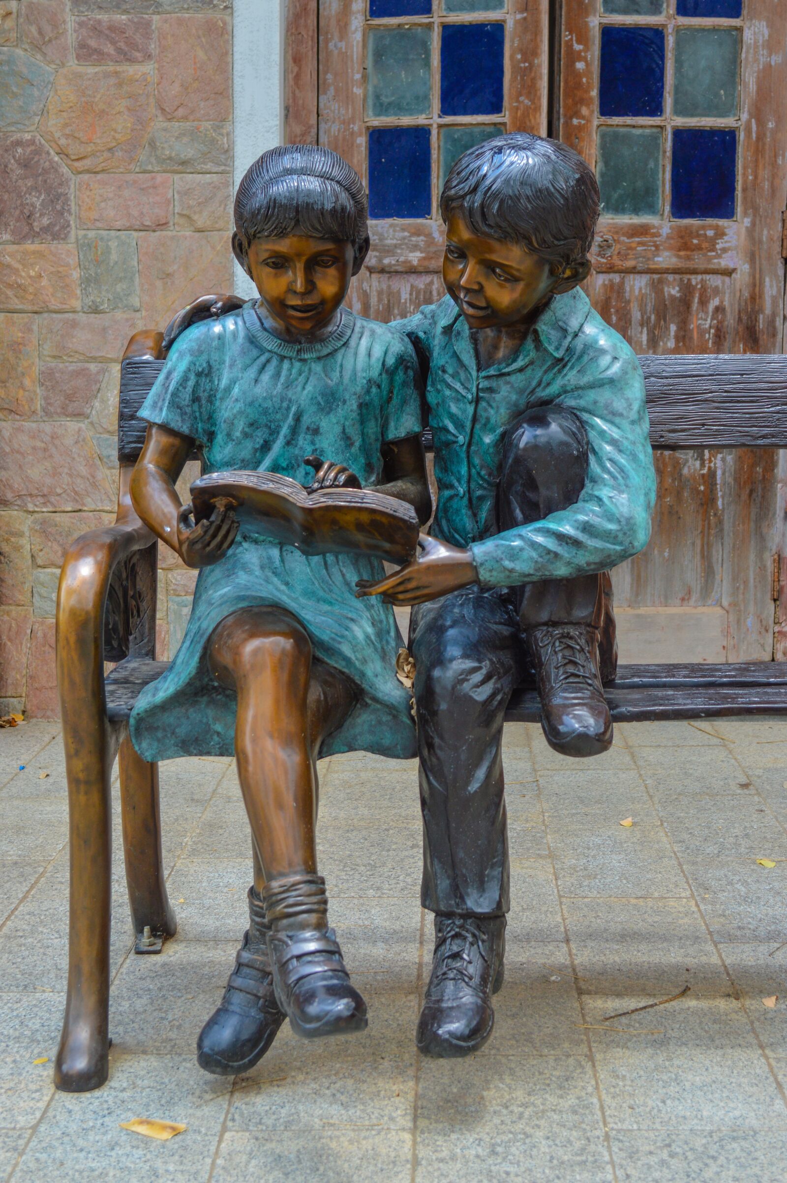 Nikon D3200 sample photo. Boy and girl reading photography
