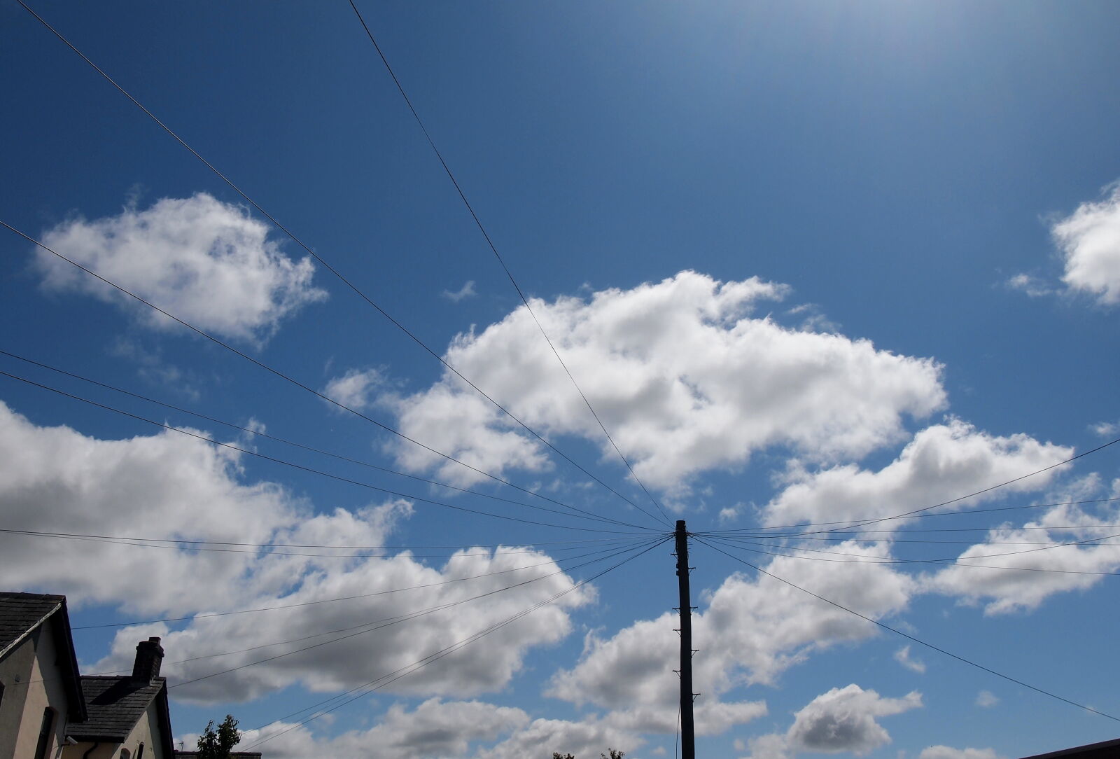 Olympus PEN E-PL2 sample photo. Clouds, summer photography