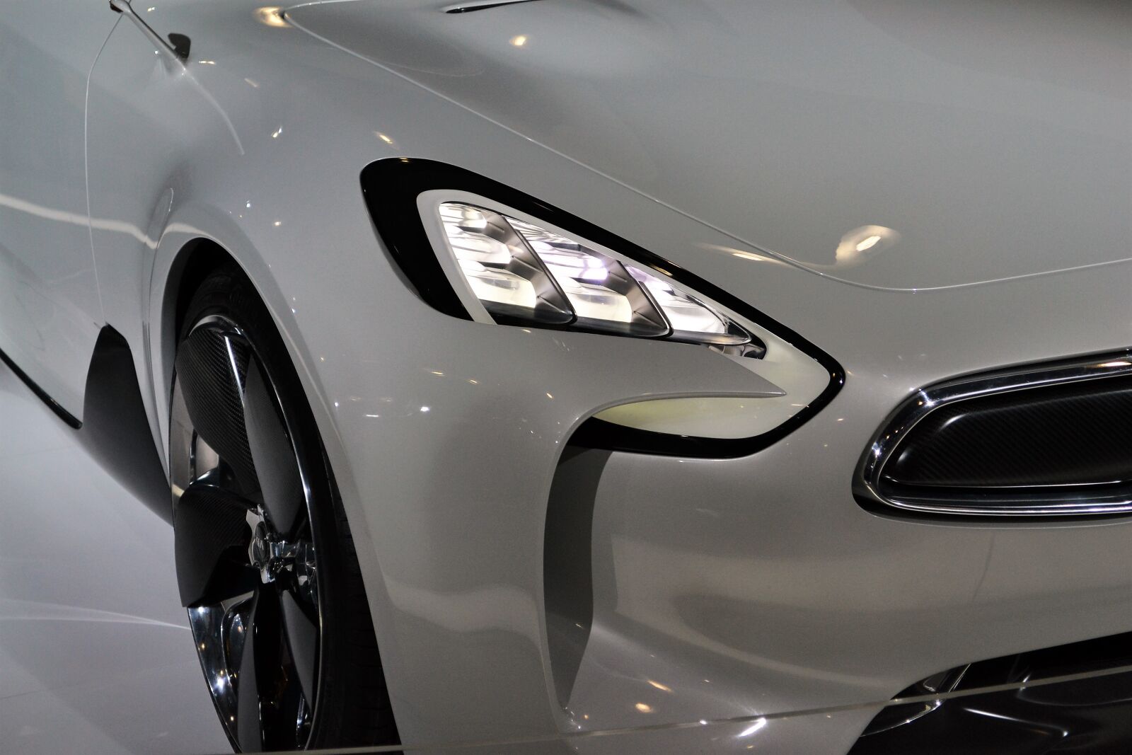 Nikon D3100 sample photo. Kia car, headlight, headlamp photography