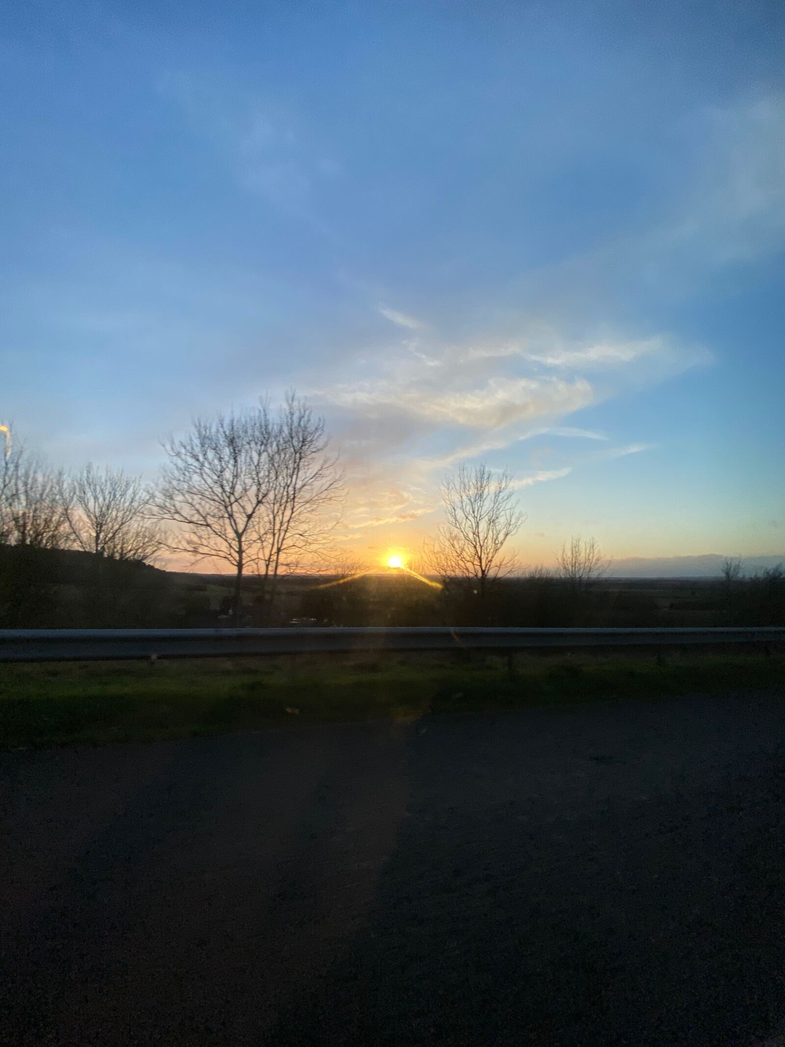 iPhone 11 Pro back triple camera 1.54mm f/2.4 sample photo. Sunset, highway, travel photography