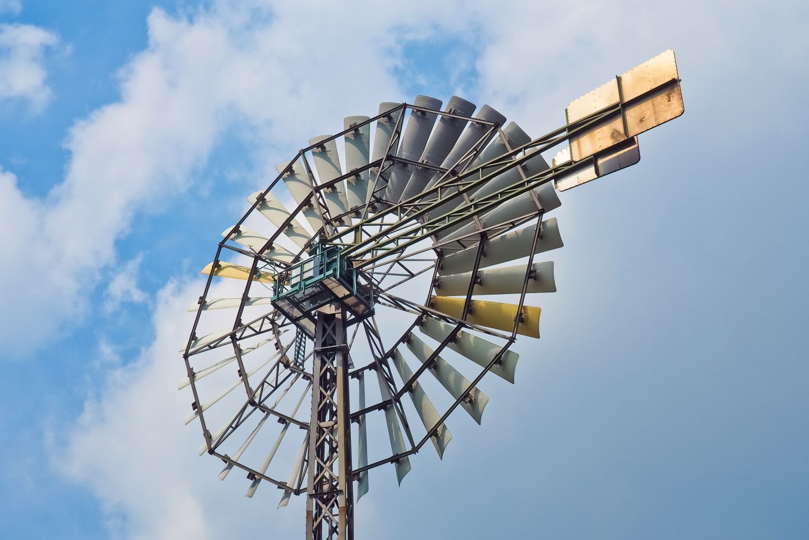Olympus OM-D E-M10 sample photo. Pinwheel, wheel, wind photography