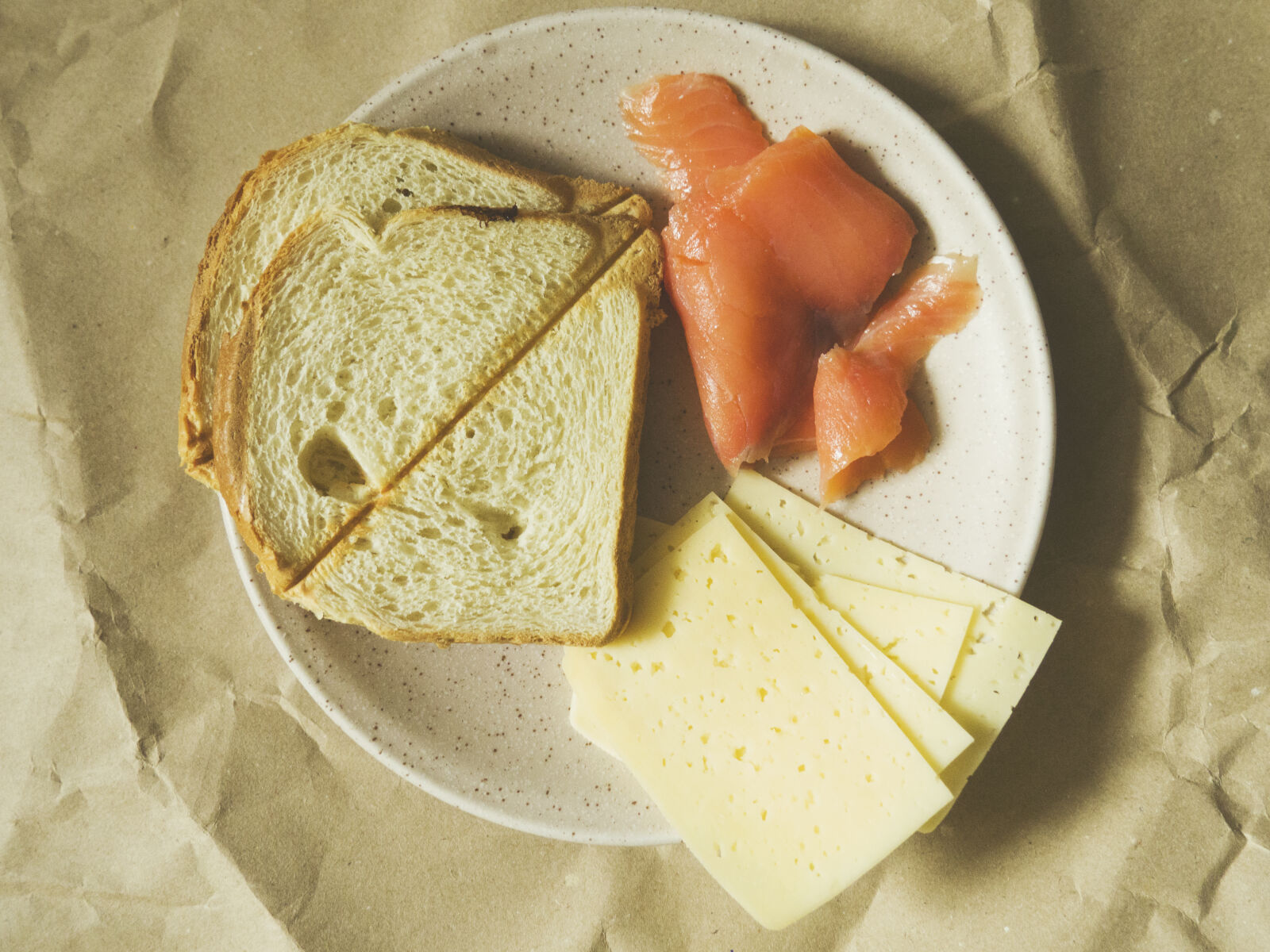 Olympus OM-D E-M10 II sample photo. Bread, cheese, and, raw photography