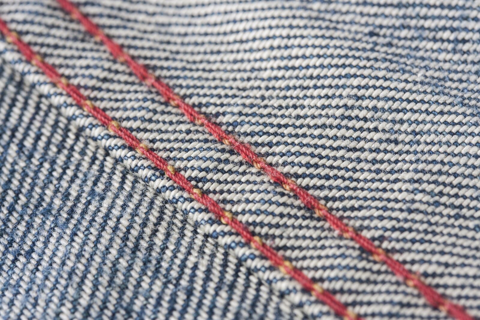 Canon EOS 40D + Canon EF-S 60mm F2.8 Macro USM sample photo. Jeans, fabric, red photography