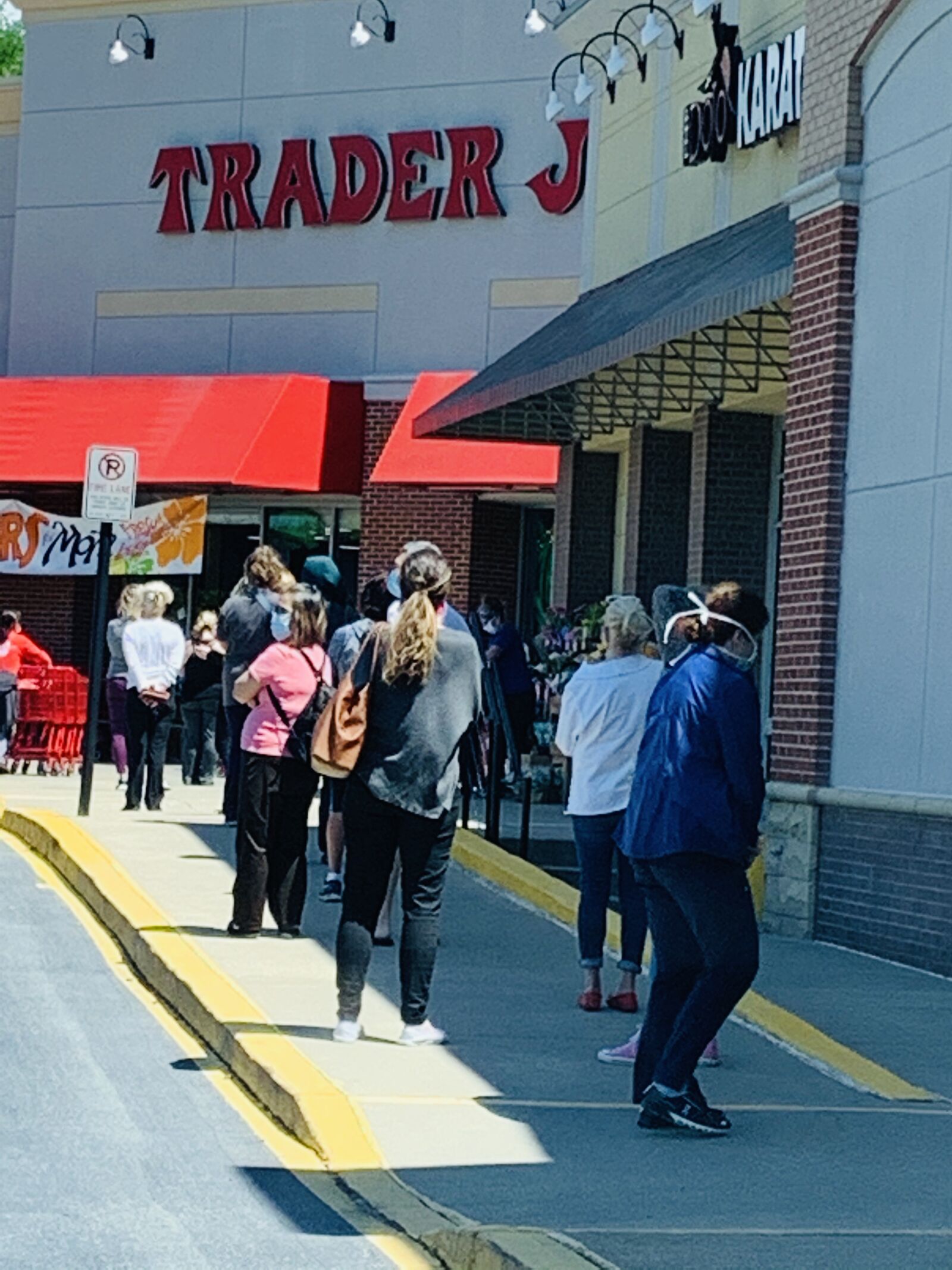 Apple iPhone XR sample photo. Grocery store, line, social photography