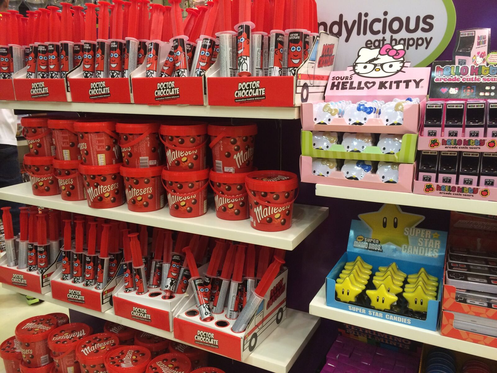 Apple iPhone 5s sample photo. Dubai, supermarket, candy photography