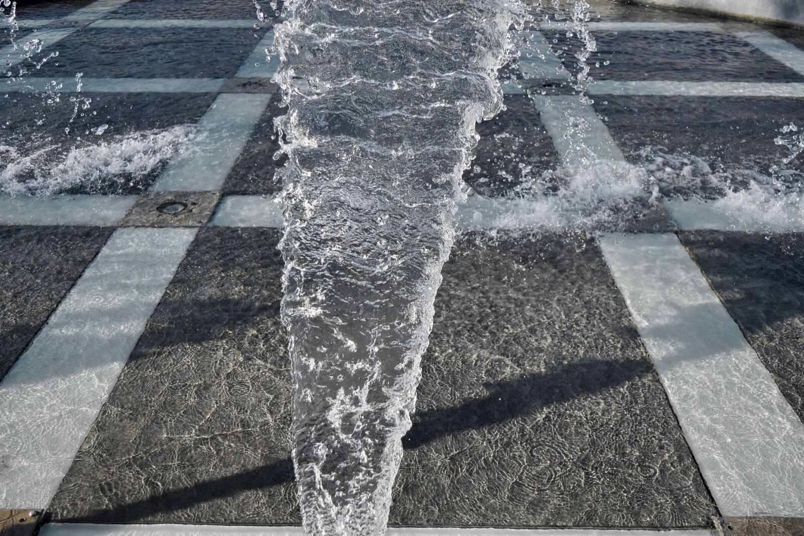 Nikon D5500 sample photo. Capital city, splash, pavement photography