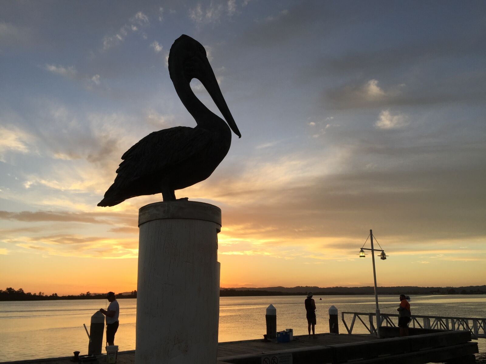 Apple iPhone 6 sample photo. Pelican, statue, silhouettes photography