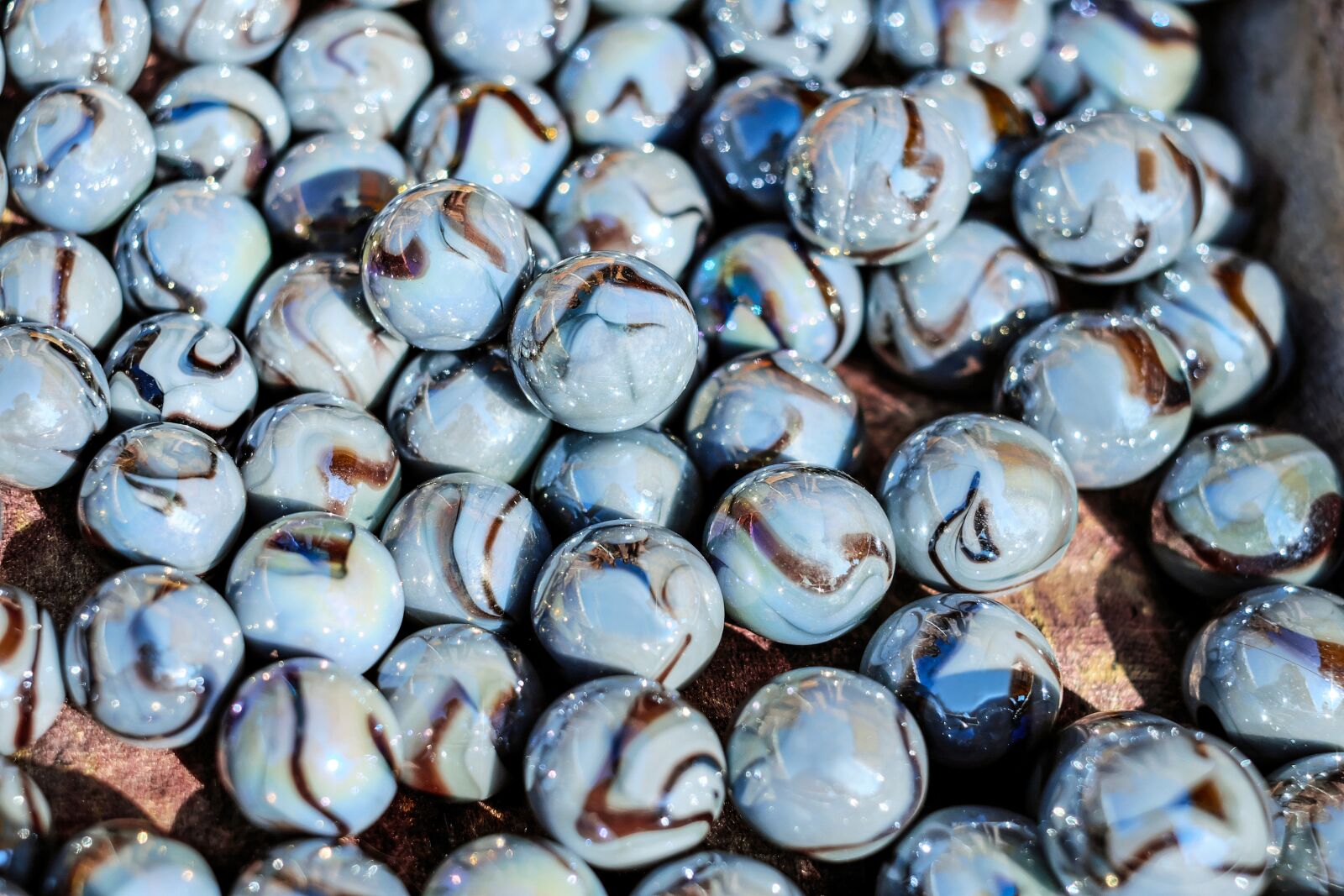 Fujifilm X-T10 + Fujifilm XF 35mm F1.4 R sample photo. Marbles, glass marbles, round photography