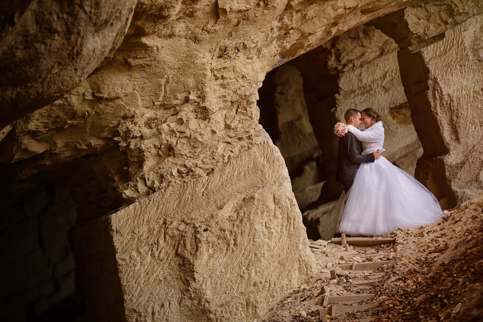 Canon EF 70-200mm F2.8L IS II USM sample photo. Underground, cave, hugging, bride photography