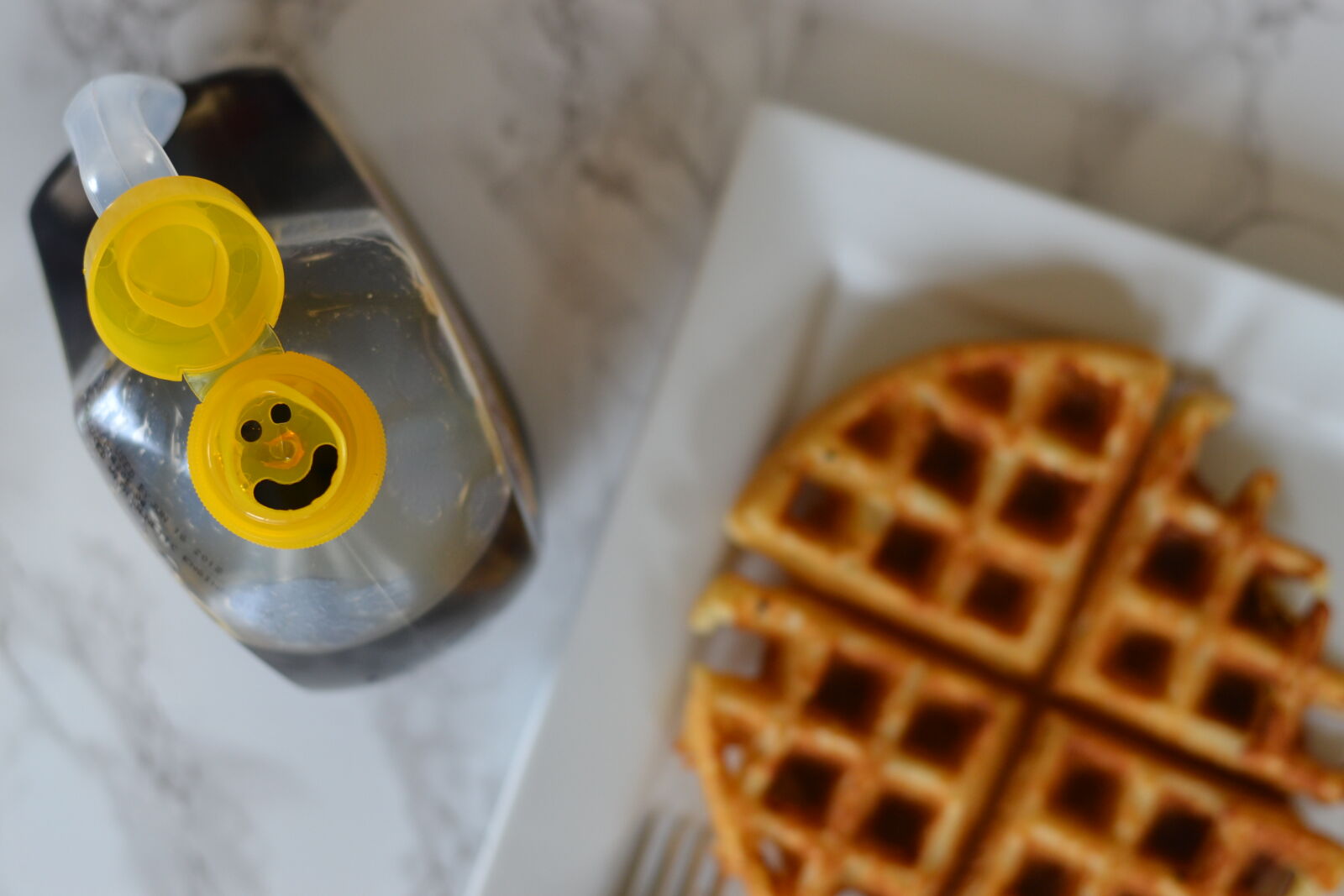 Nikon D3100 + Nikon AF-S Nikkor 50mm F1.8G sample photo. Breakfast, smile, syrup, waffle photography