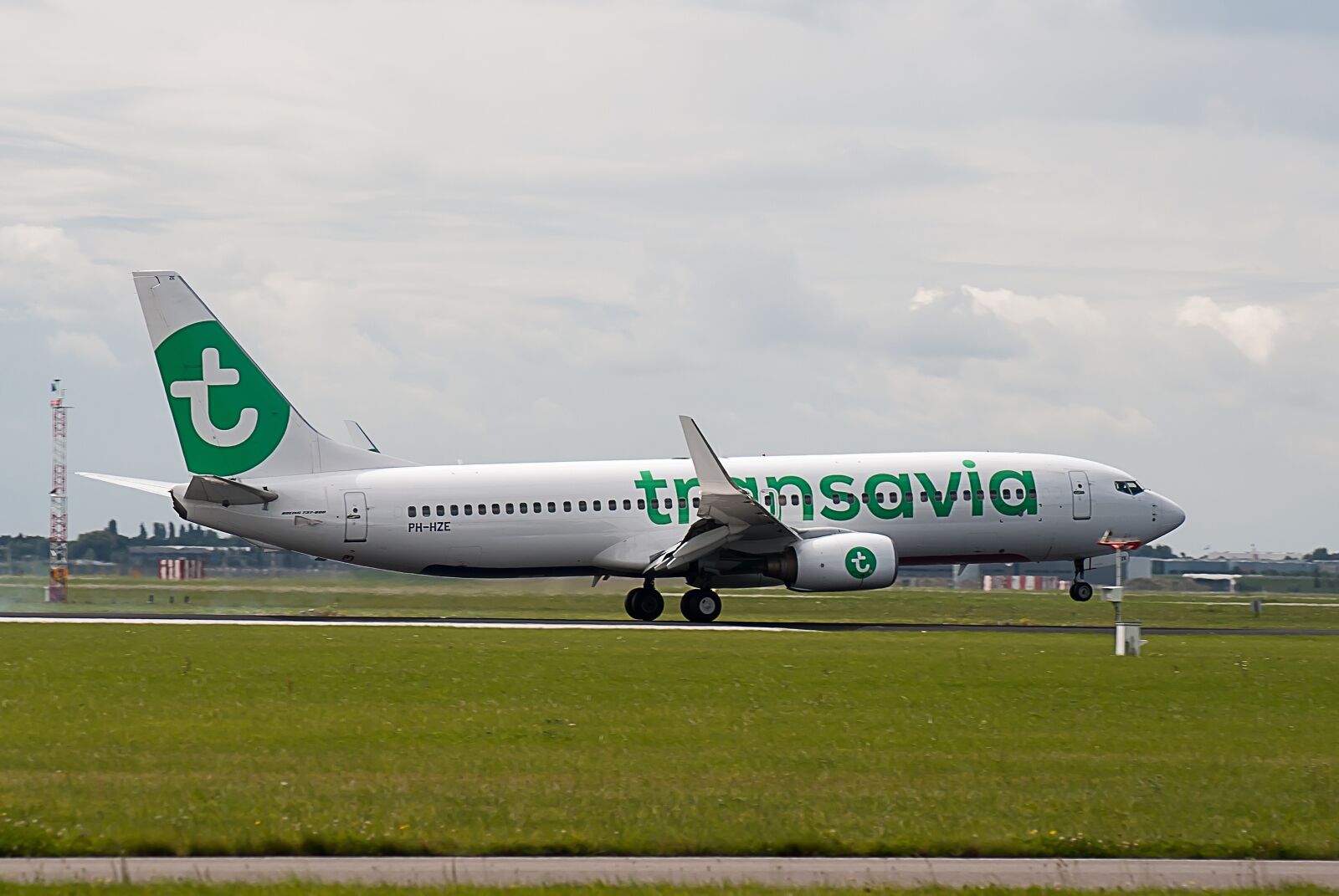 Nikon D3000 sample photo. Plane, runway, airline photography