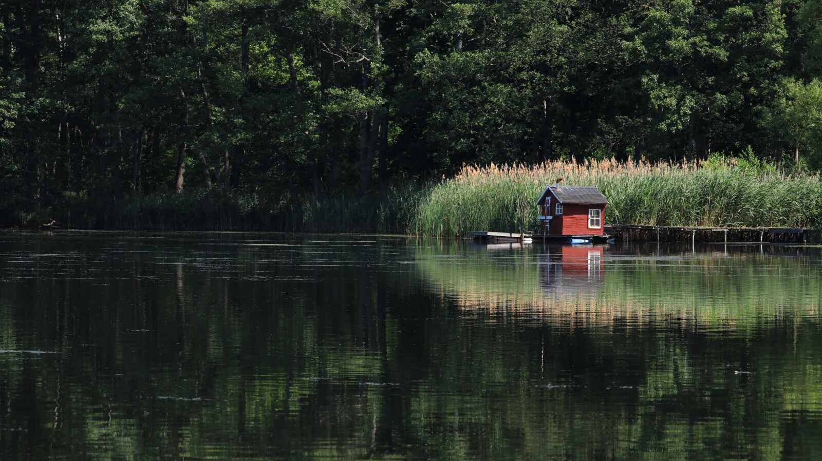 150-600mm F5-6.3 DG OS HSM | Contemporary 015 sample photo. Lake, landscape, hut photography