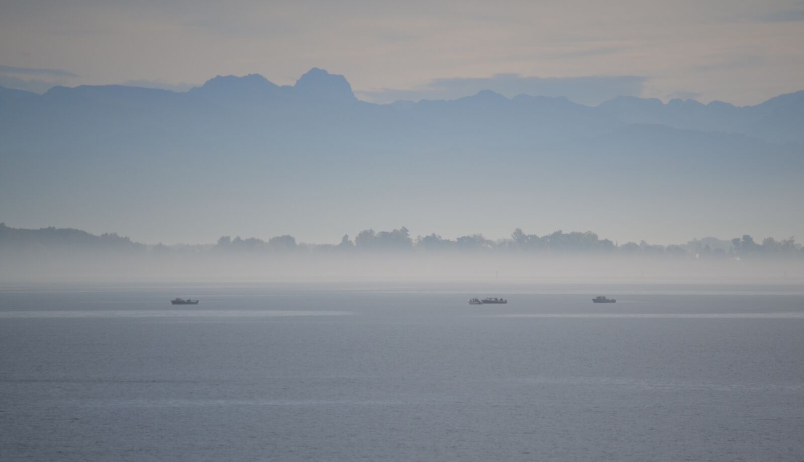 Nikon D3100 sample photo. Blue, boat, lake, mist photography