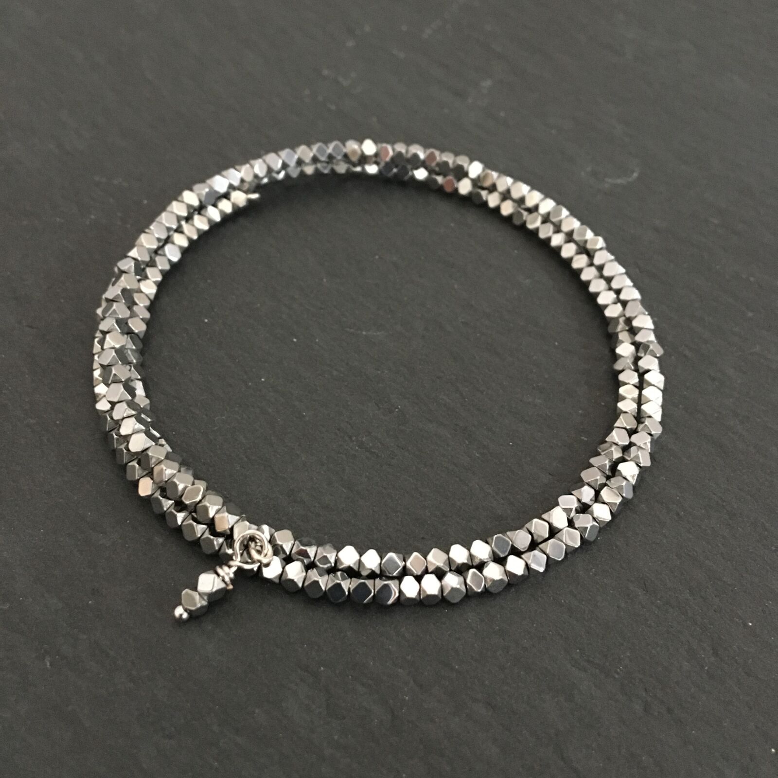 iPhone 6s back camera 4.15mm f/2.2 sample photo. Memory wire bracelet, bracelet photography
