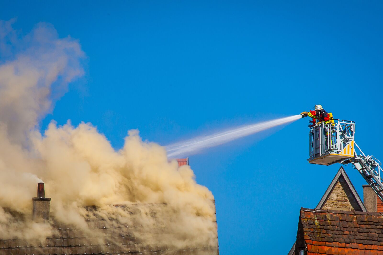 Canon EOS 50D + Canon EF 24-105mm F4L IS USM sample photo. Smoke, fire, brand photography
