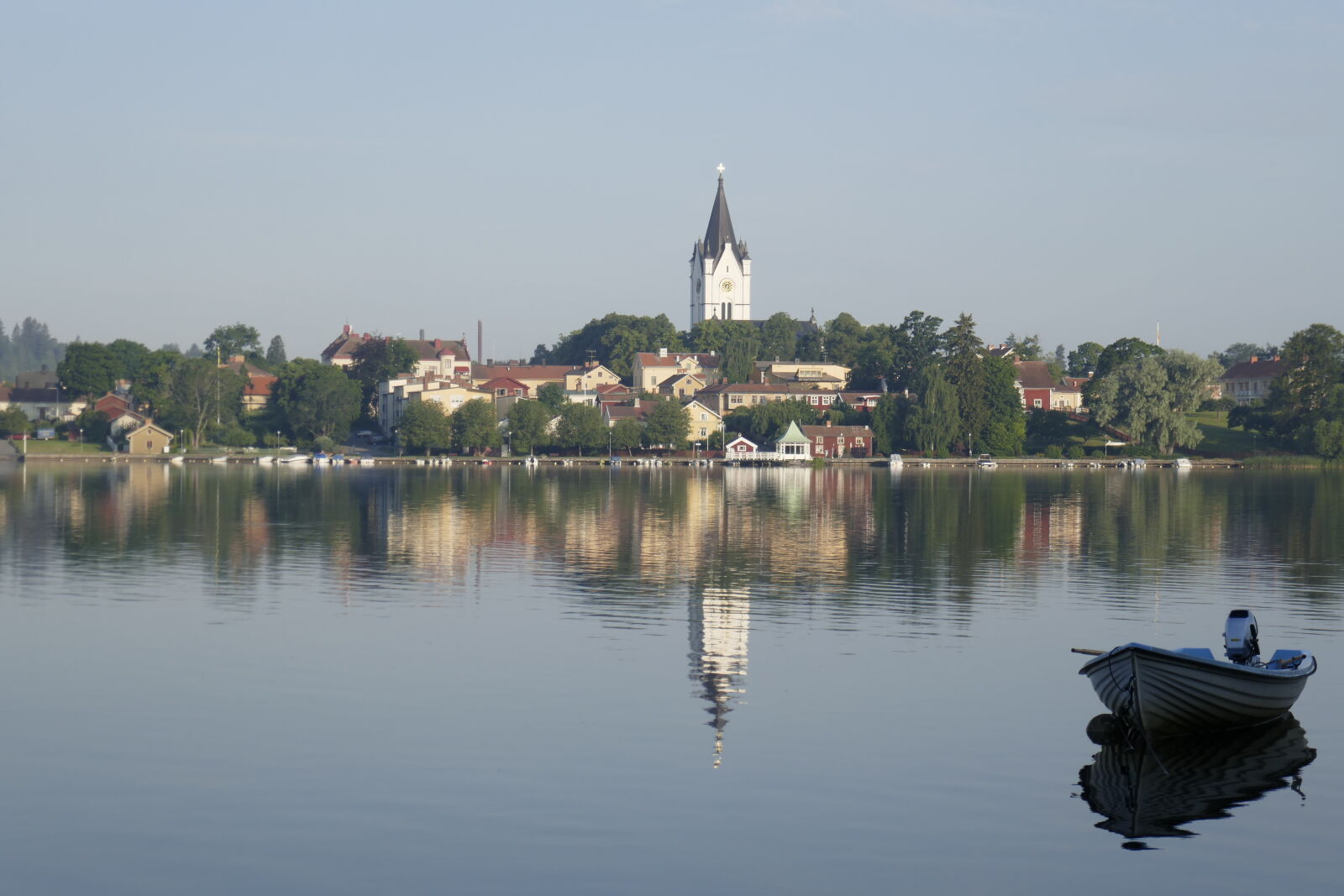 Panasonic Lumix DMC-ZS100 (Lumix DMC-TZ100) sample photo. Boat, lake, steeple, sweden photography
