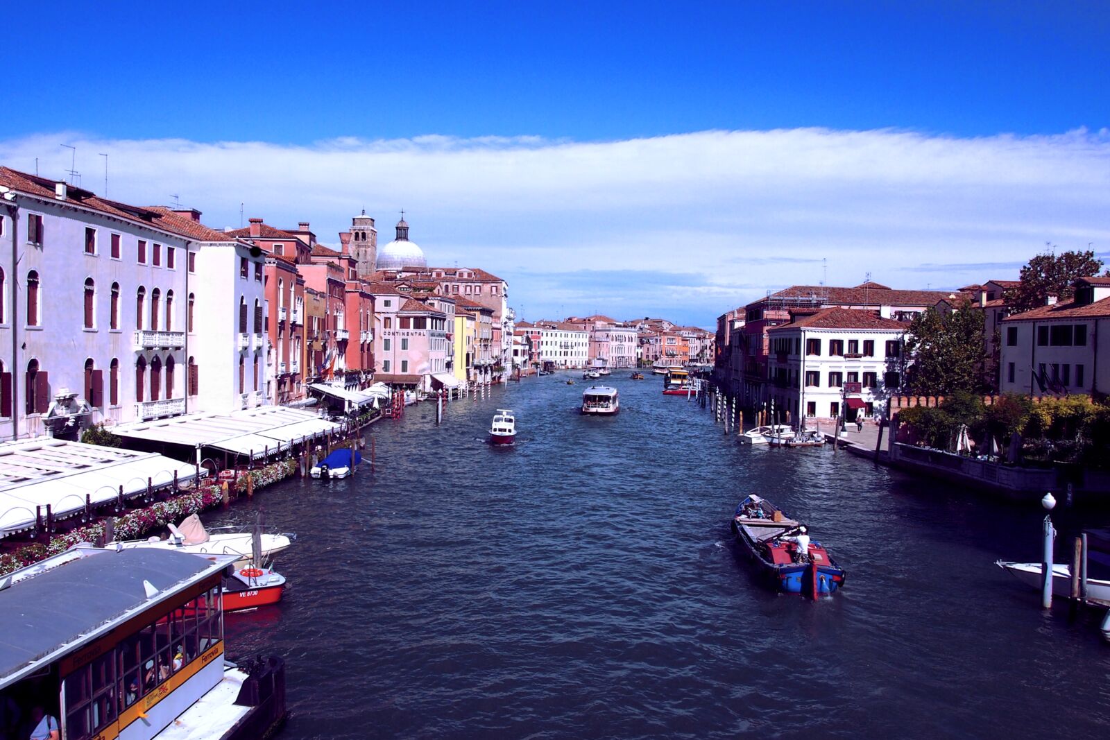 Olympus PEN E-PM1 sample photo. Architecture, blue, sky, boats photography