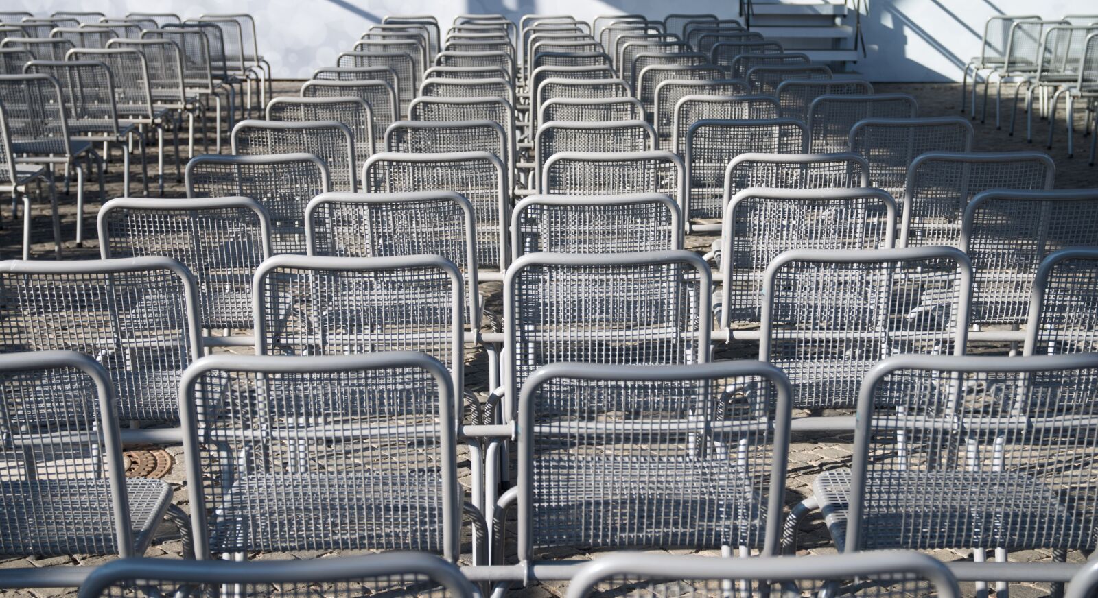 Pentax K-50 sample photo. Chairs, metal, rows of photography