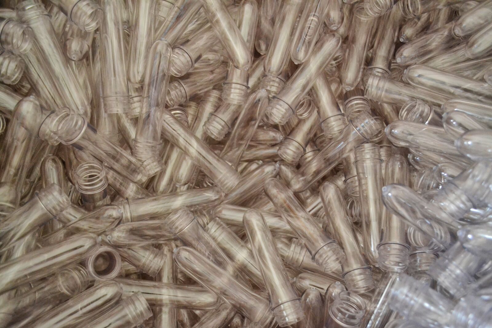 Nikon D3100 sample photo. Pet preforms, material, polyethylene photography