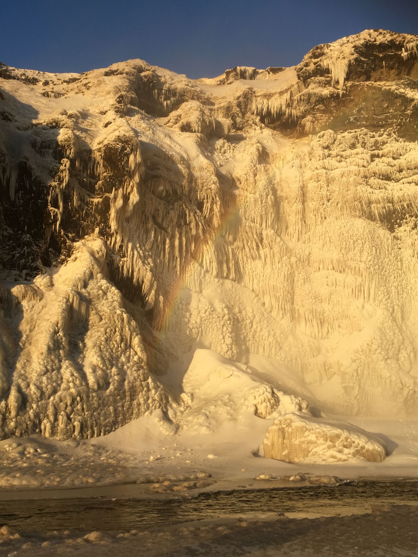 iPhone SE back camera 4.15mm f/2.2 sample photo. Iceland, waterfall, rainbow photography