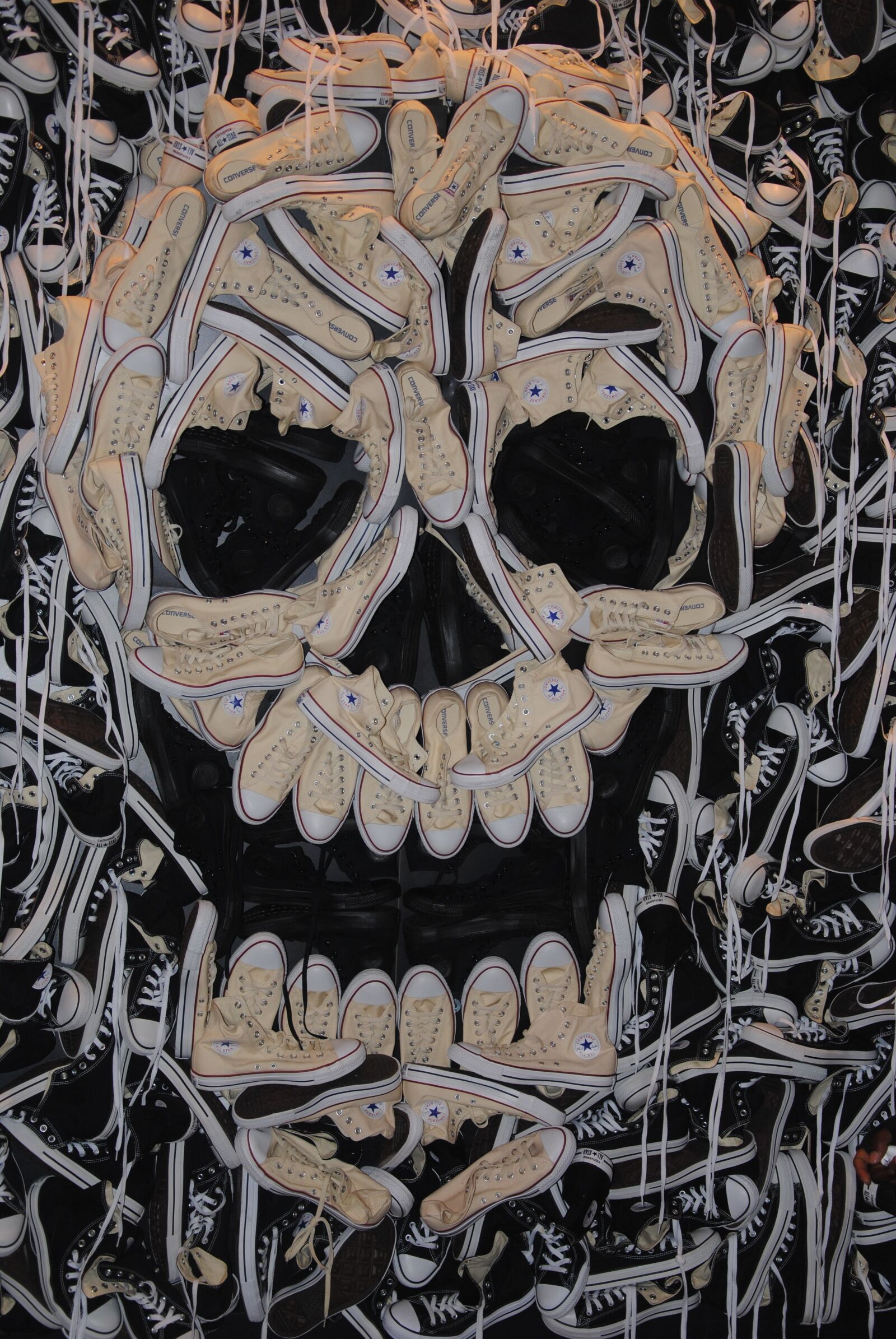 Nikon D3000 sample photo. Converse, skull and crossbones photography