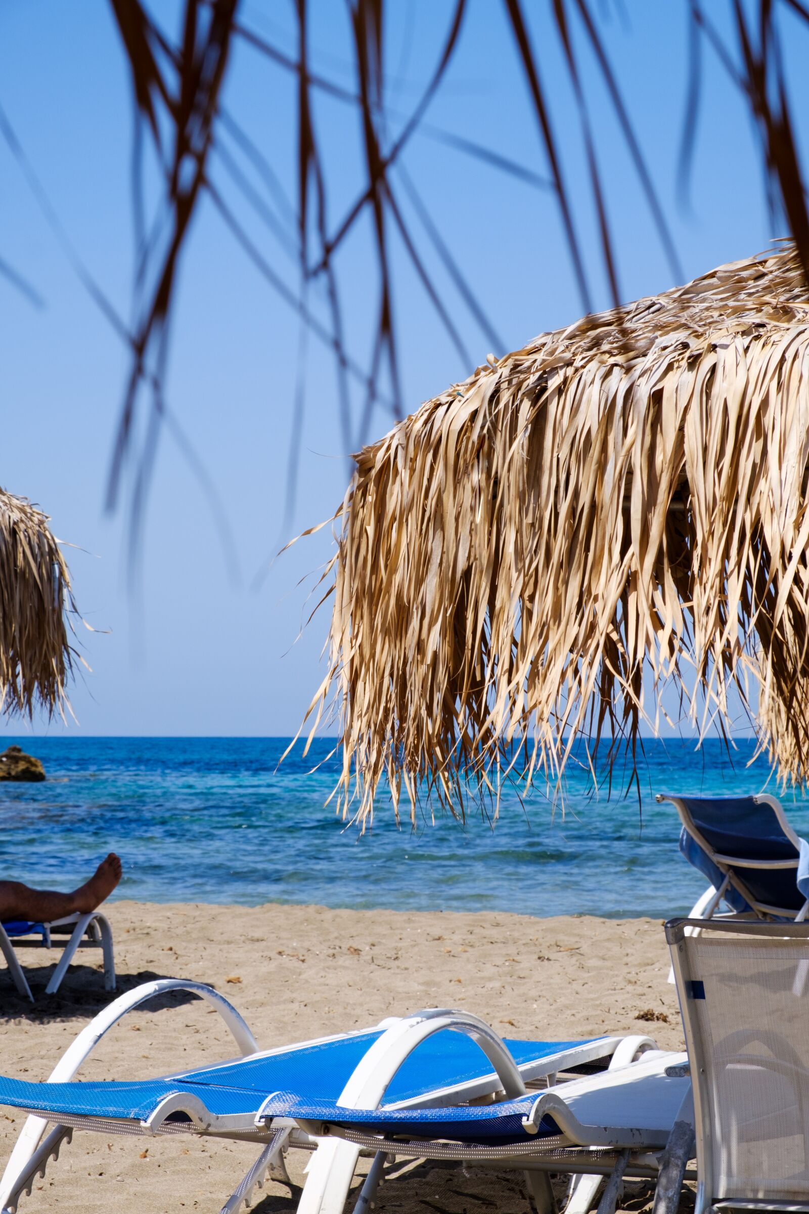 Fujifilm XF 18-55mm F2.8-4 R LM OIS sample photo. Beach, water, parasol photography