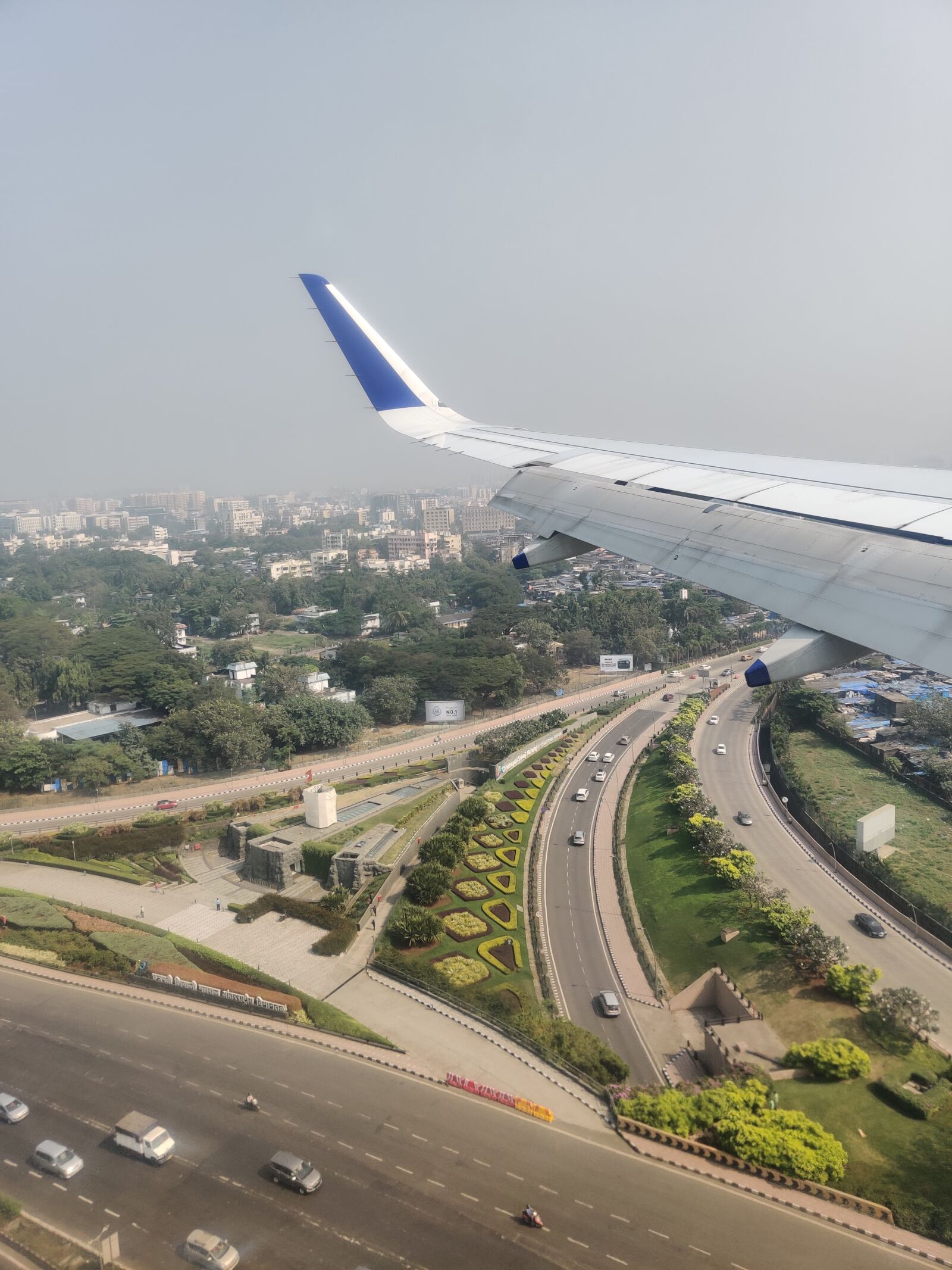 OnePlus HD1901 sample photo. Landing, window seat, flight photography