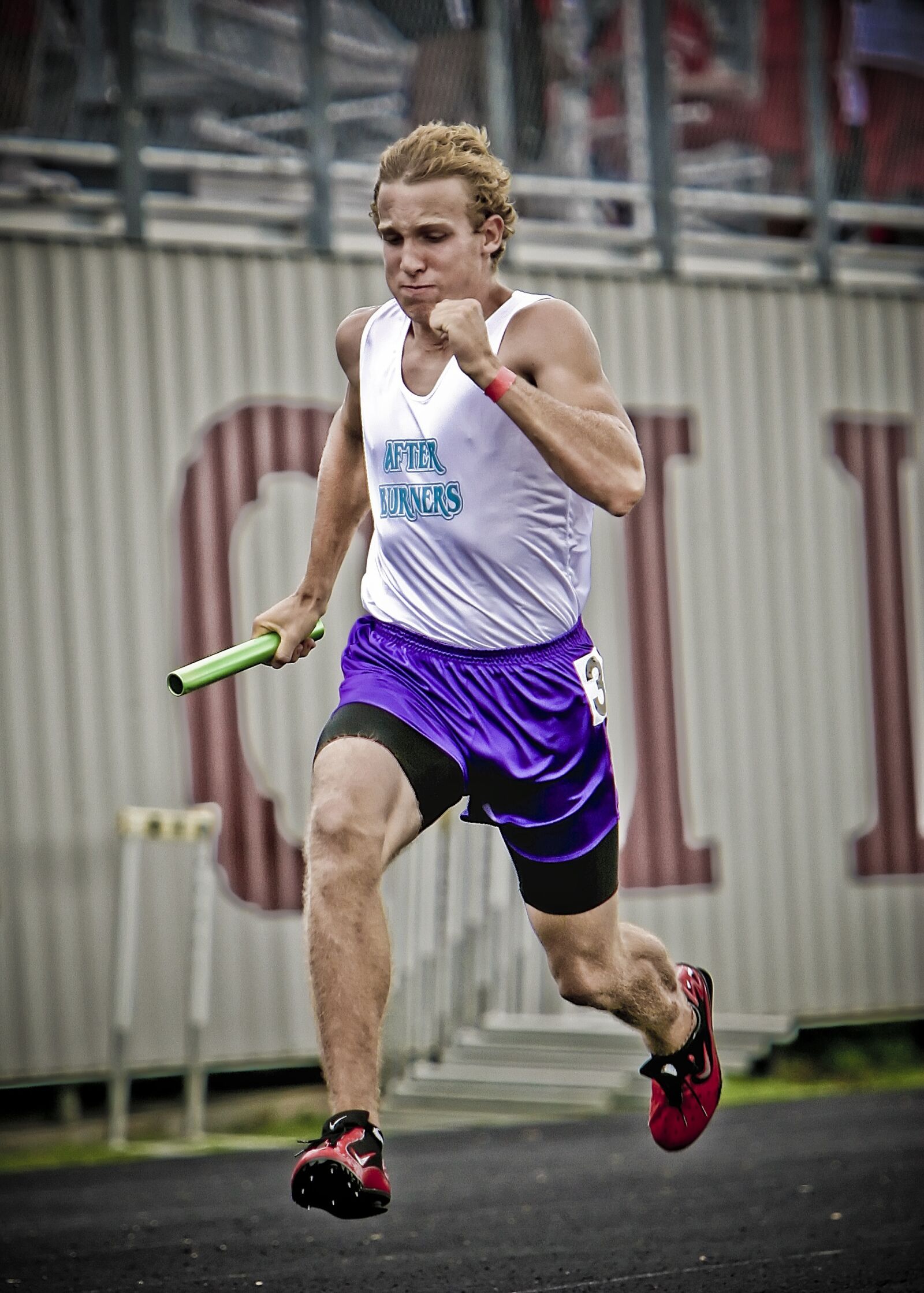Canon EOS 20D sample photo. Runner, track athlete, relay photography