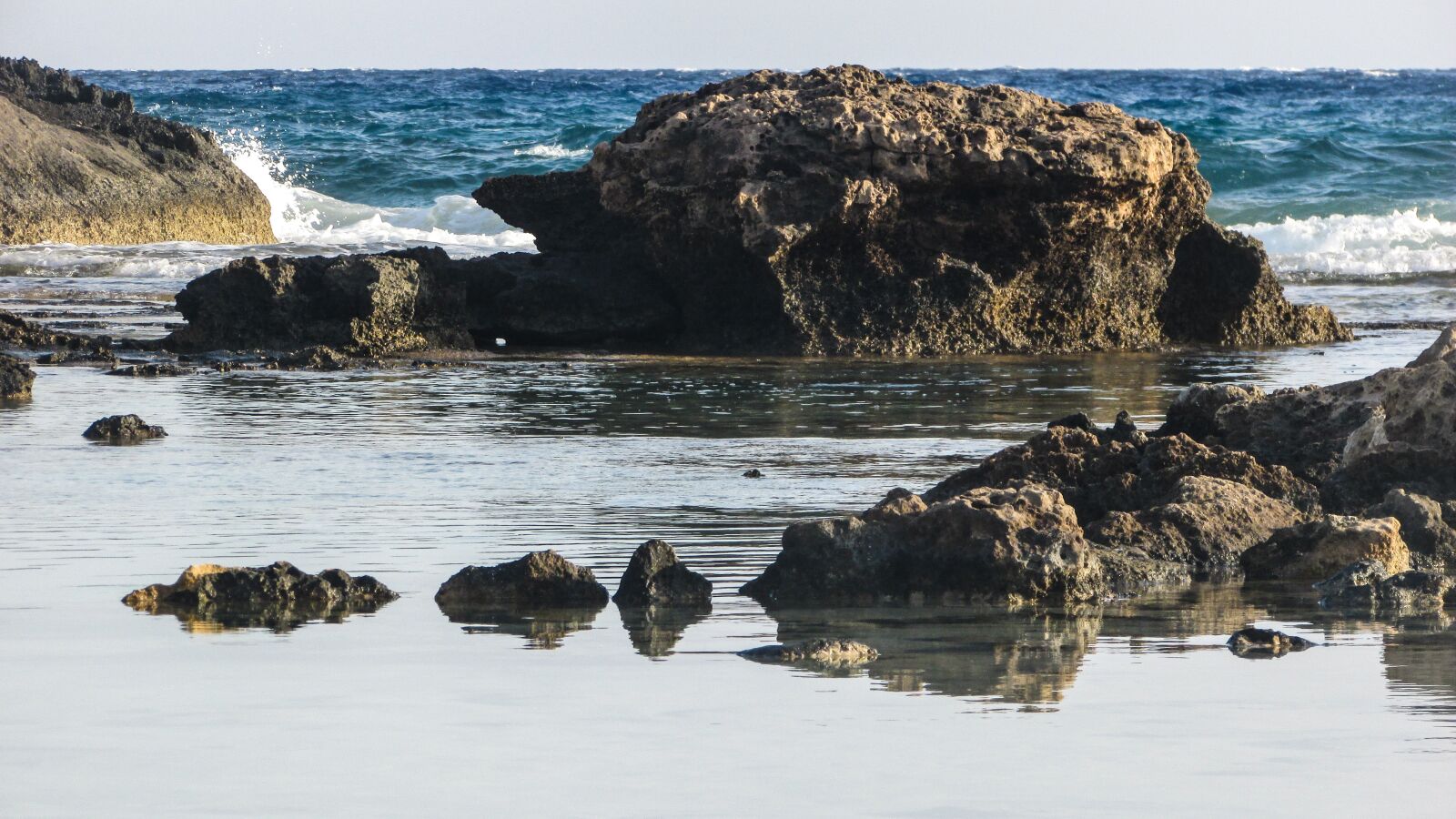 Canon PowerShot SX400 IS sample photo. Lagoon, rocky coast, sea photography